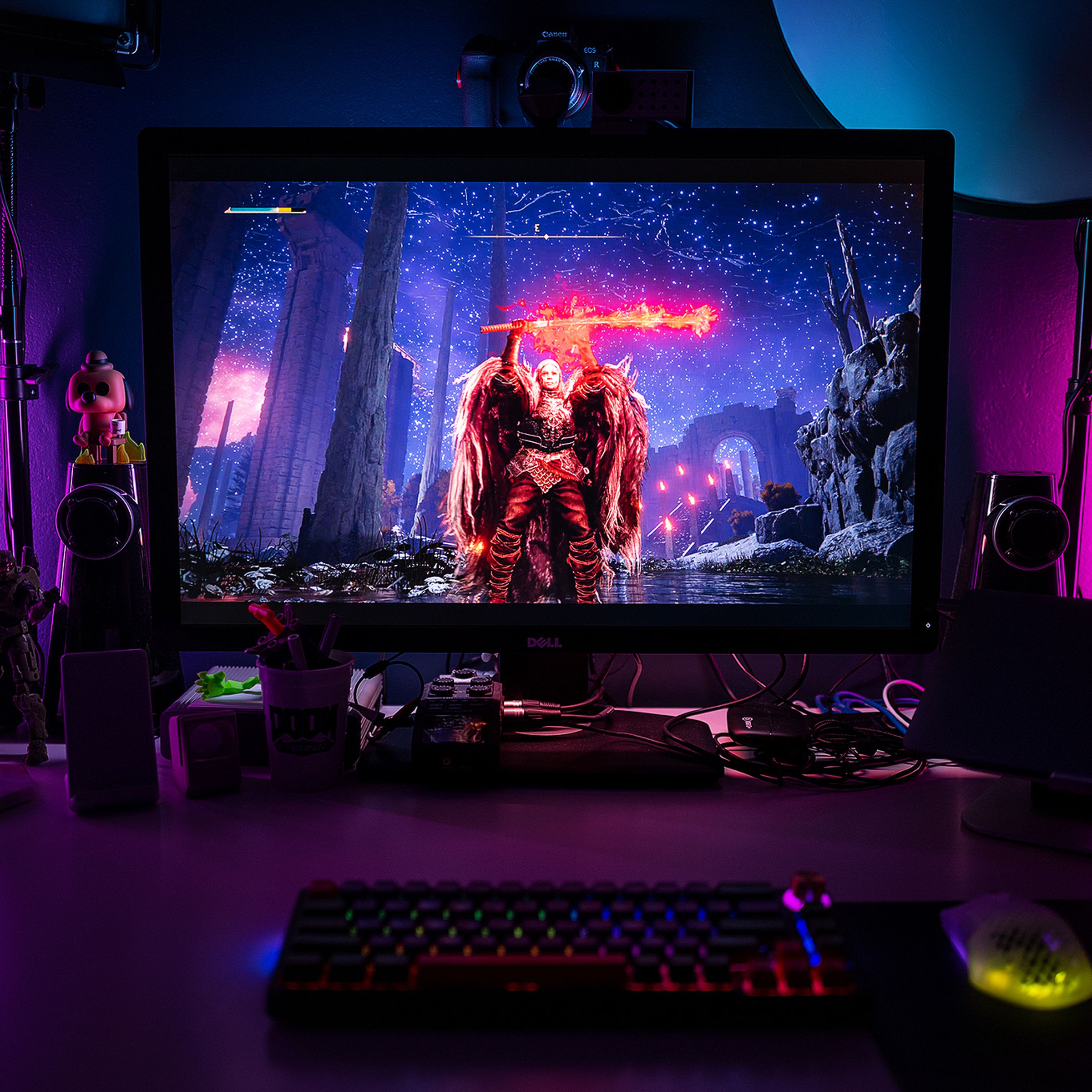 The three-point RGBIC lighting setup of the Govee DreamView G1 Pro, set up on a monitor on a desk.