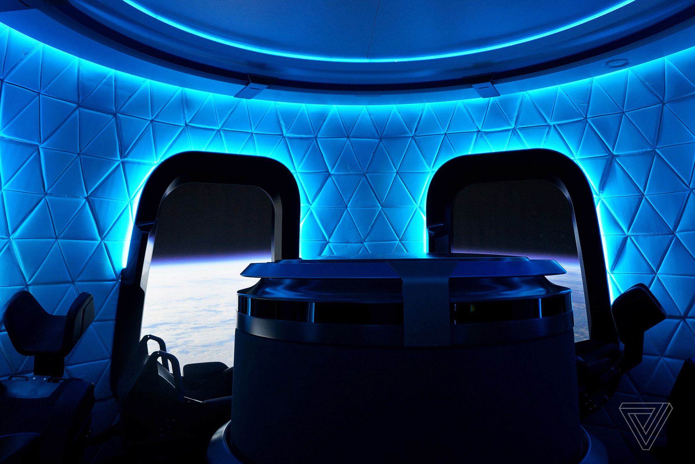 The interior of a mock-up Blue Origin crew capsule.