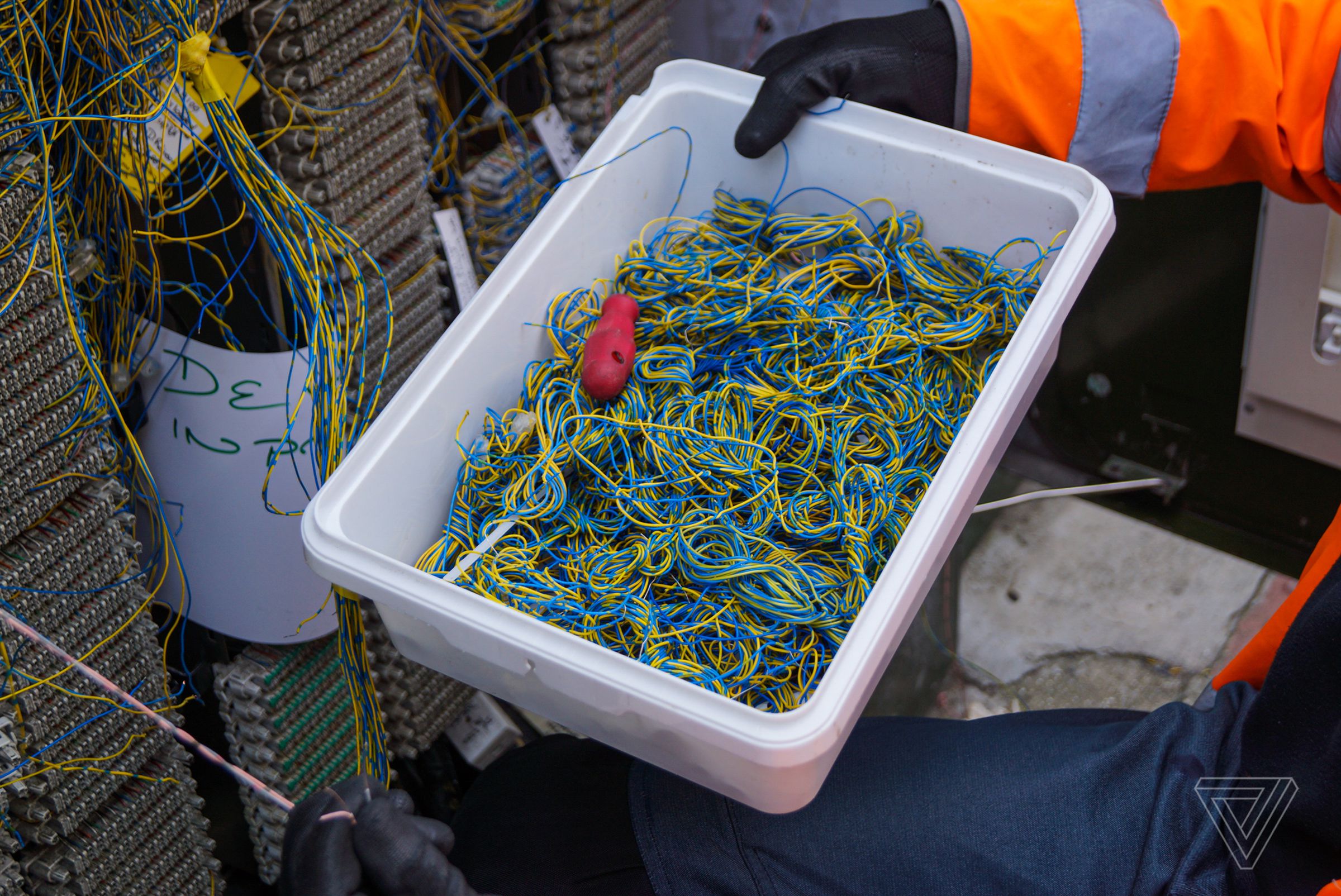 A bundle of wires being used to repair a roadside telecoms cabinet in central London. Openreach, a subsidiary of British Telecom, is the biggest company for maintaining the physical infrastructure on behalf of ISP’s who sell the services to users.