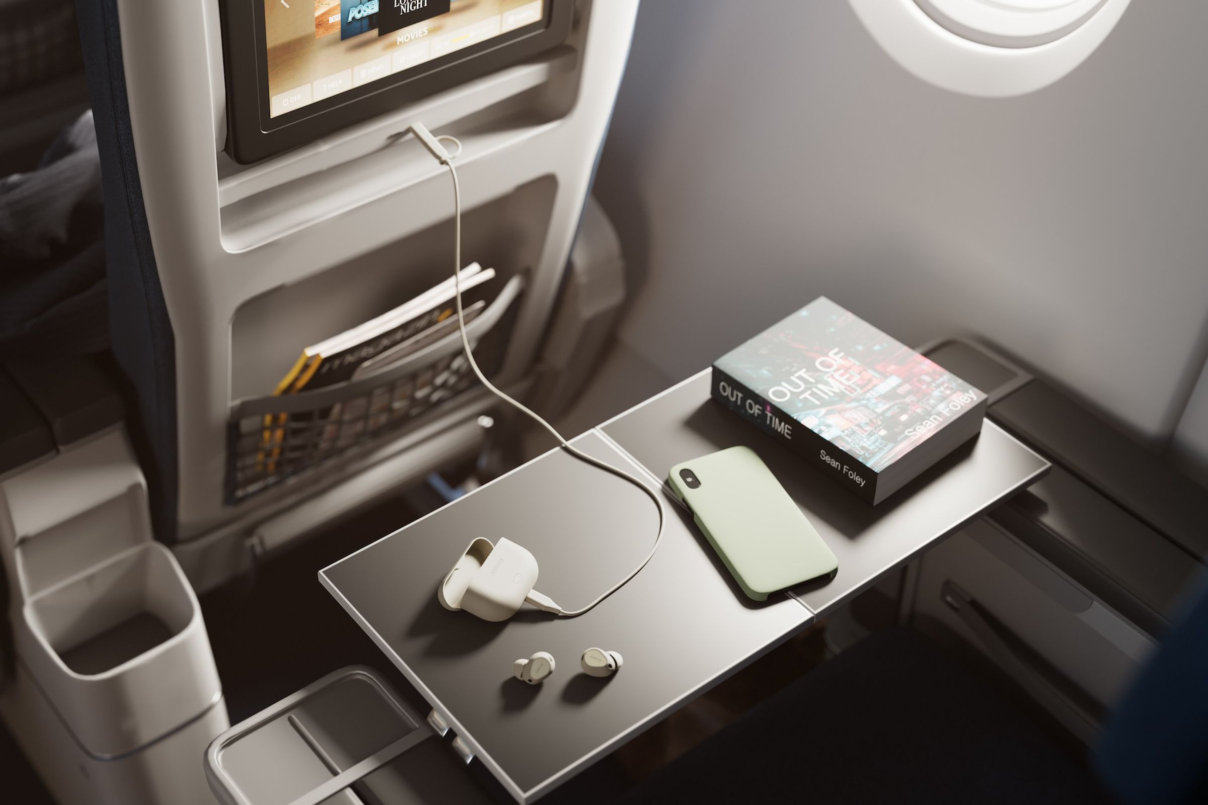 An image of the Jabra Elite 10 Gen 2 connected to an airplane’s in-flight entertainment system.