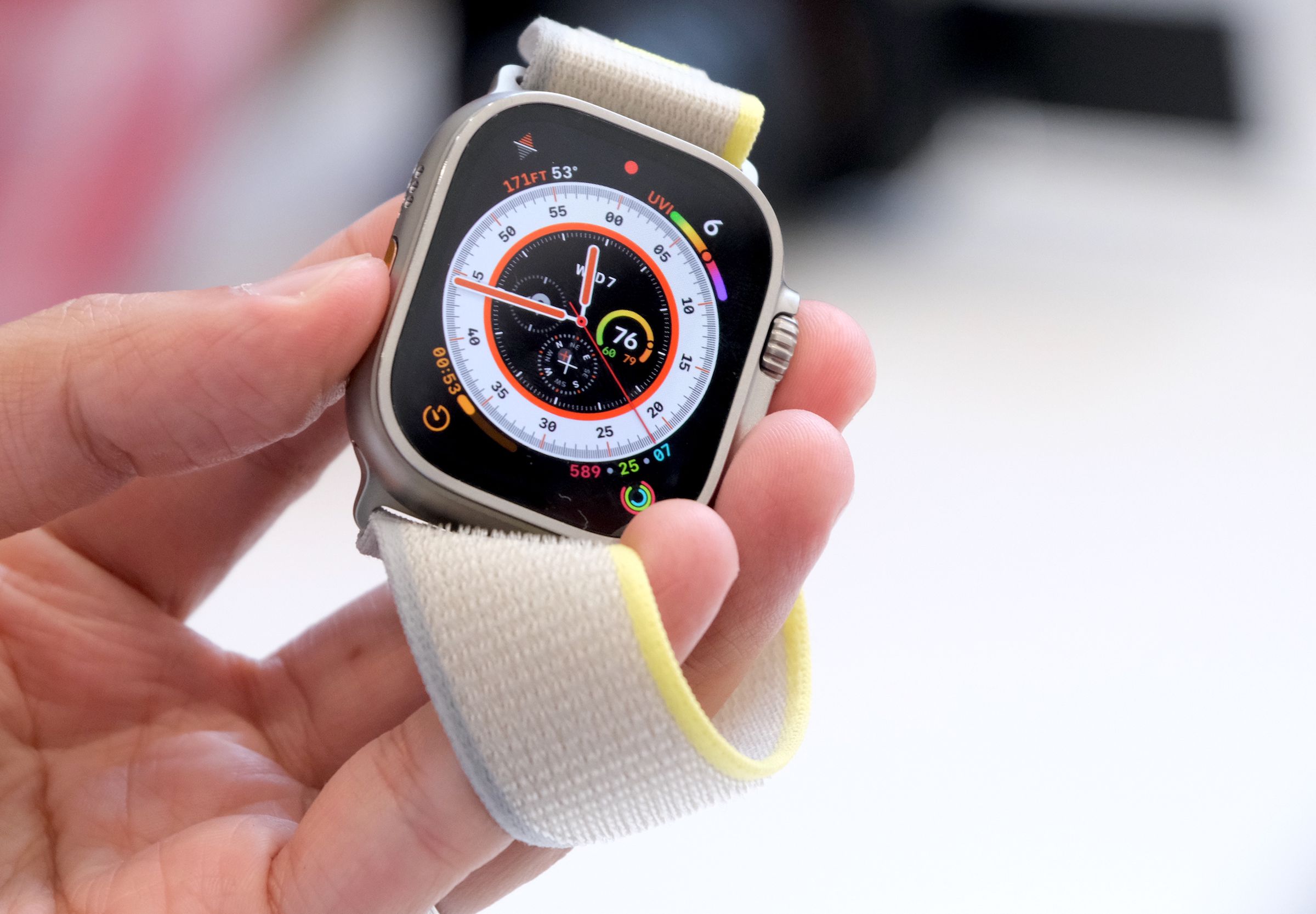 The Apple Watch Ultra features a large, flat display with a protective bezel.