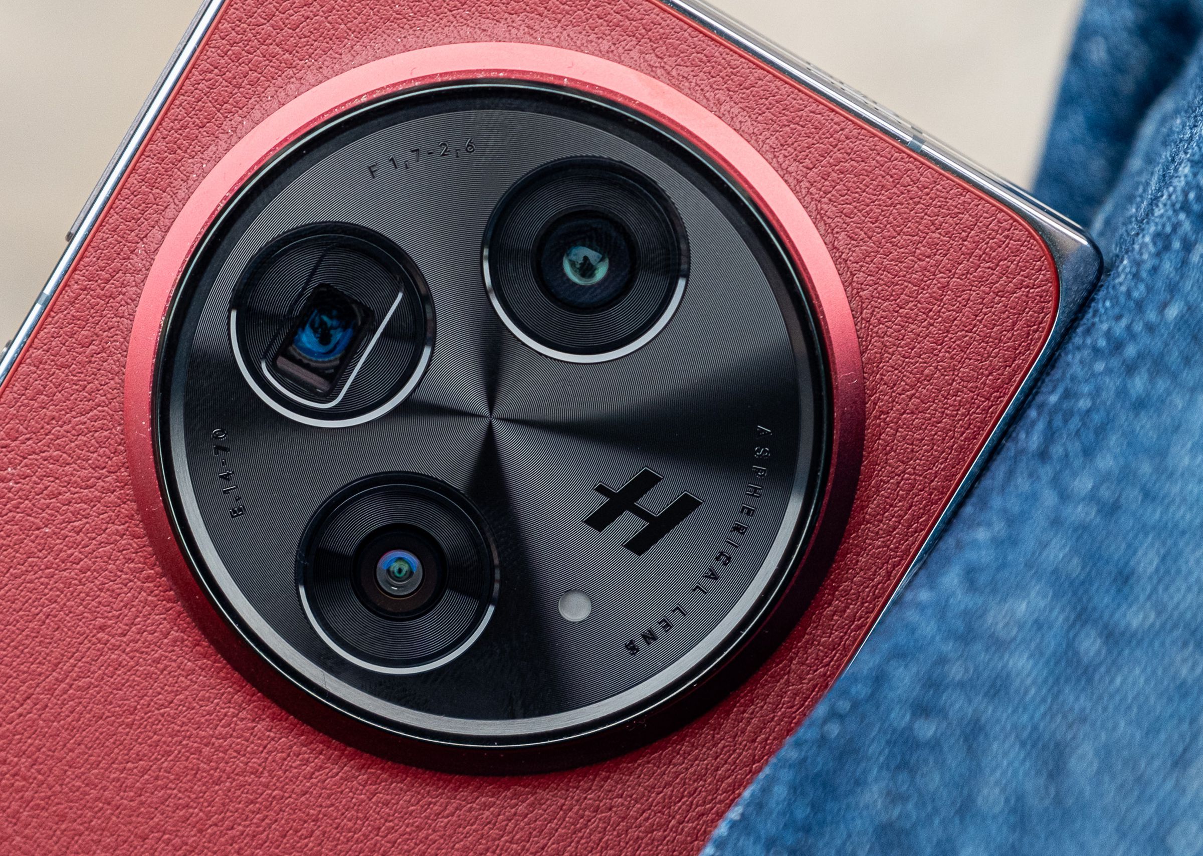 A photo of the OnePlus Open Apex Edition in crimson red.