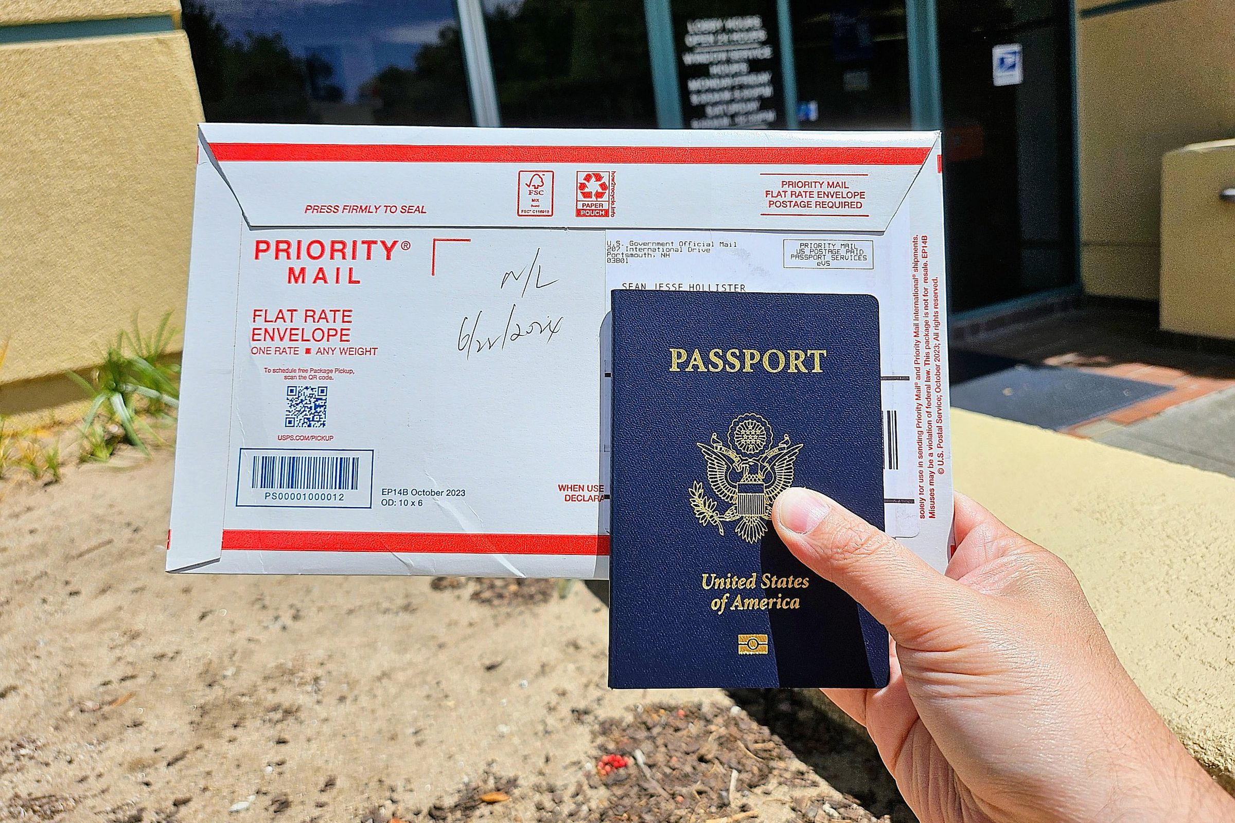 Picking up my new passport at the post office.