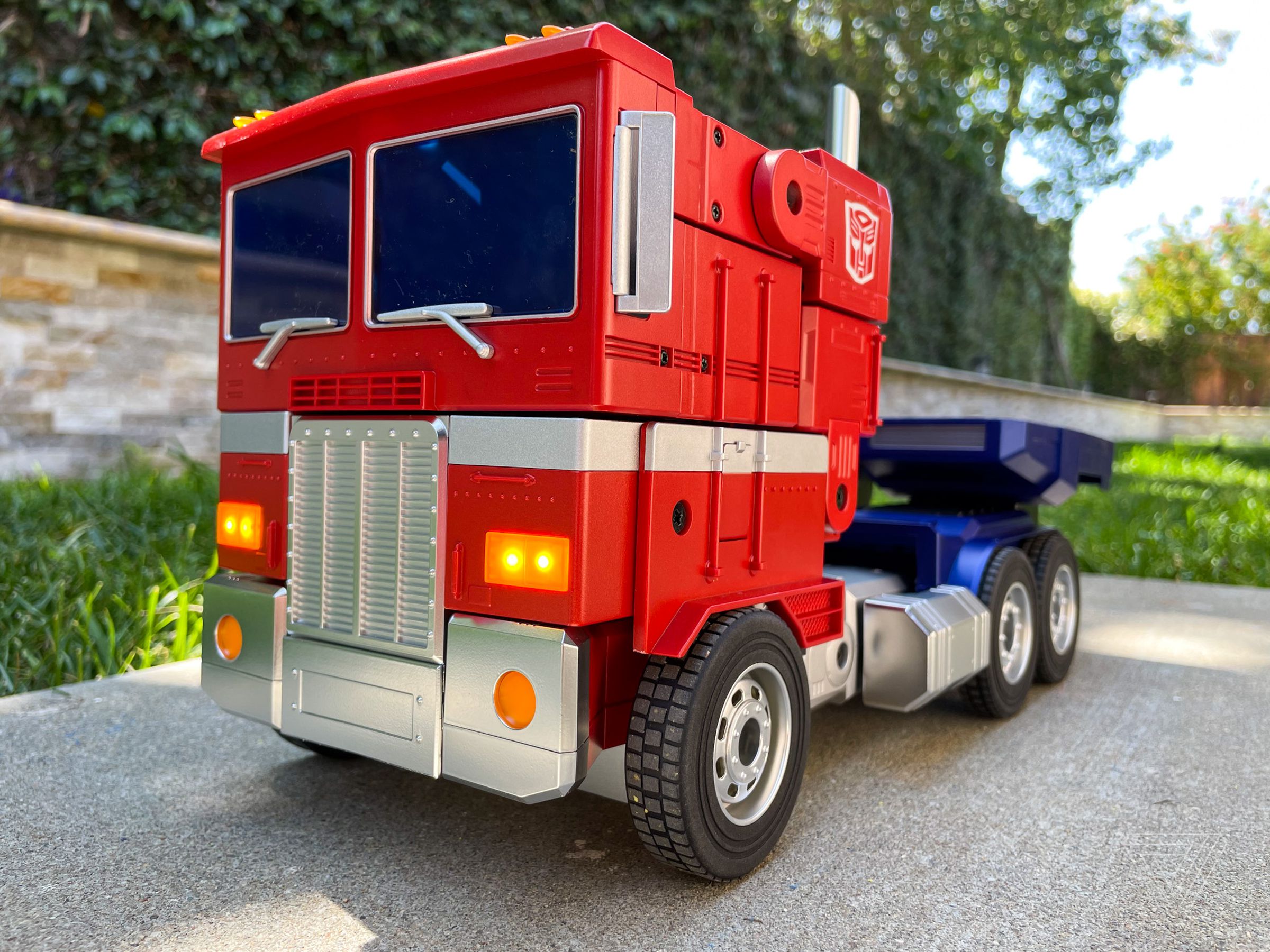 Optimus Prime in truck mode, with nice bright LED headlights and folding side mirrors.