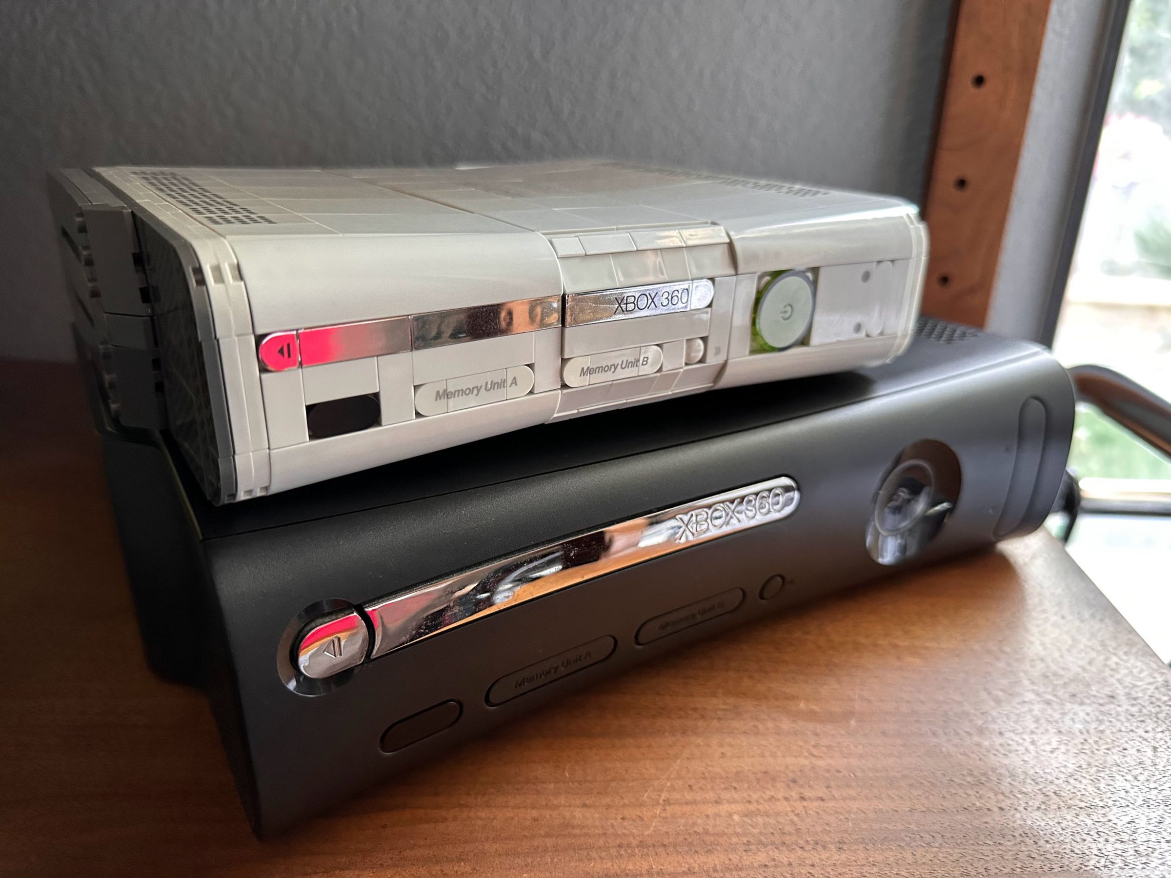 Compared to my “Jasper” Xbox 360 Elite, the best 360 ever made. The brick disc drive slot replicates the shiny chrome. Neither it nor memory card or USB slots open on the brick version, though.