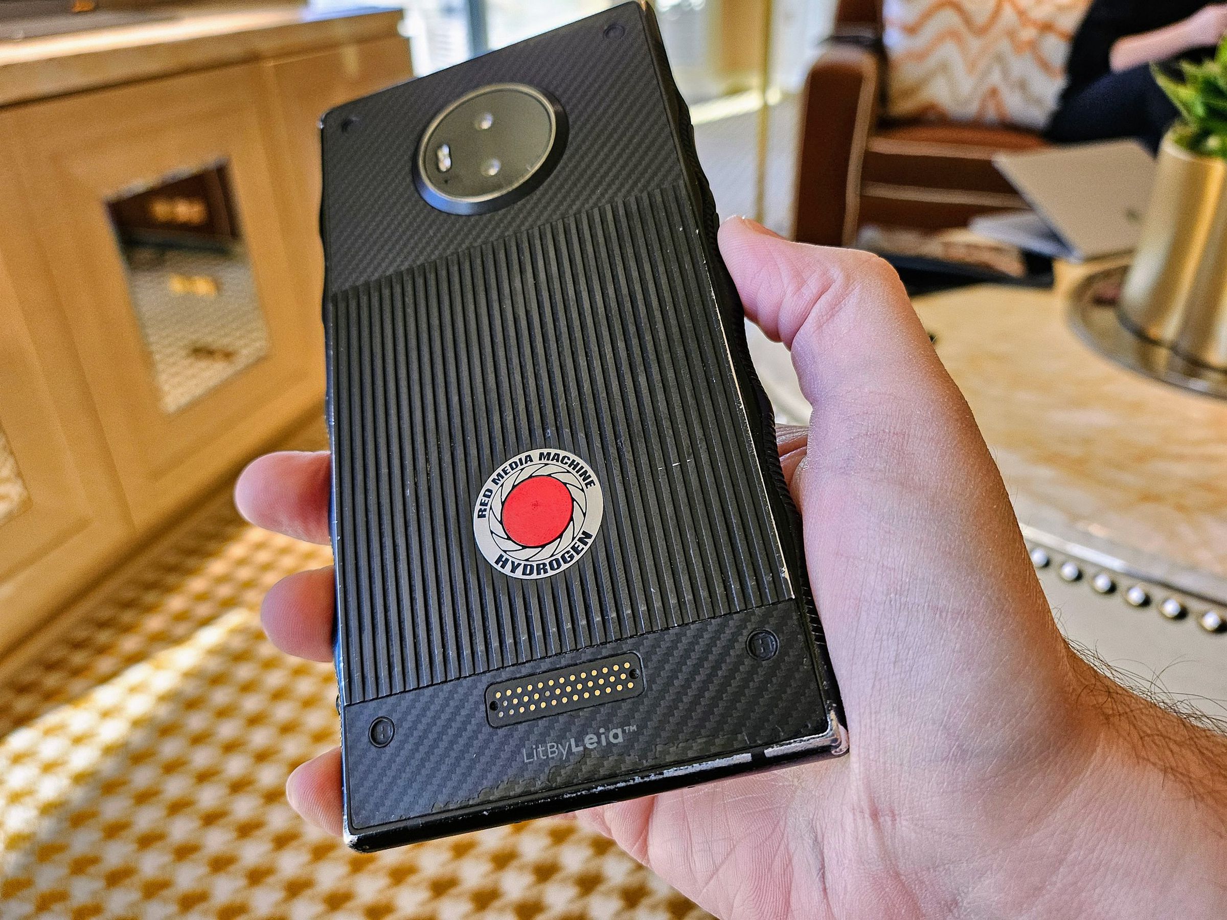 Lots of wear on this phone — but it’s the only phone ever made with his company’s brand name on the back.