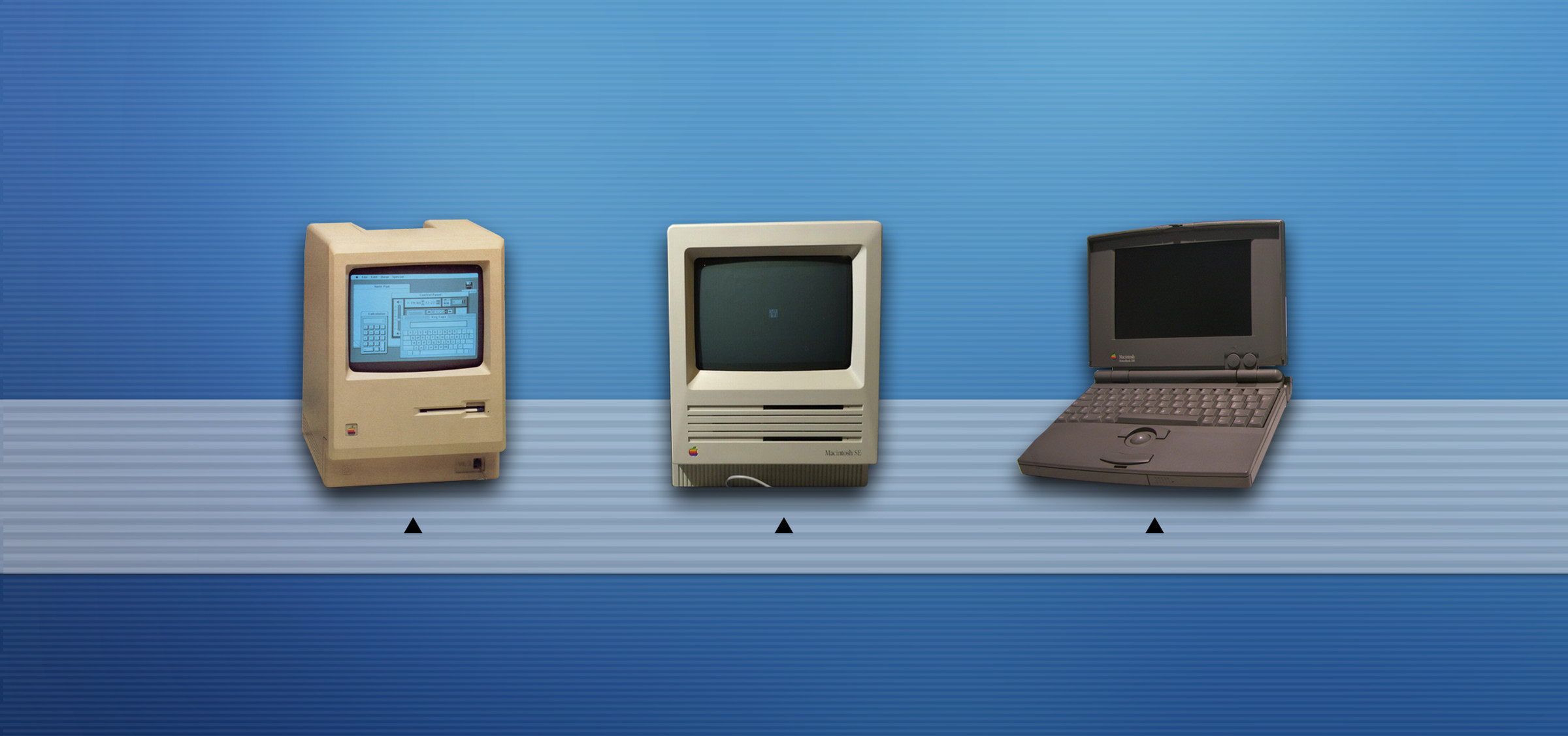 Three early Macs — two desktops and a PowerBook 100 — sit on a graphic made to look like the macOS dock.