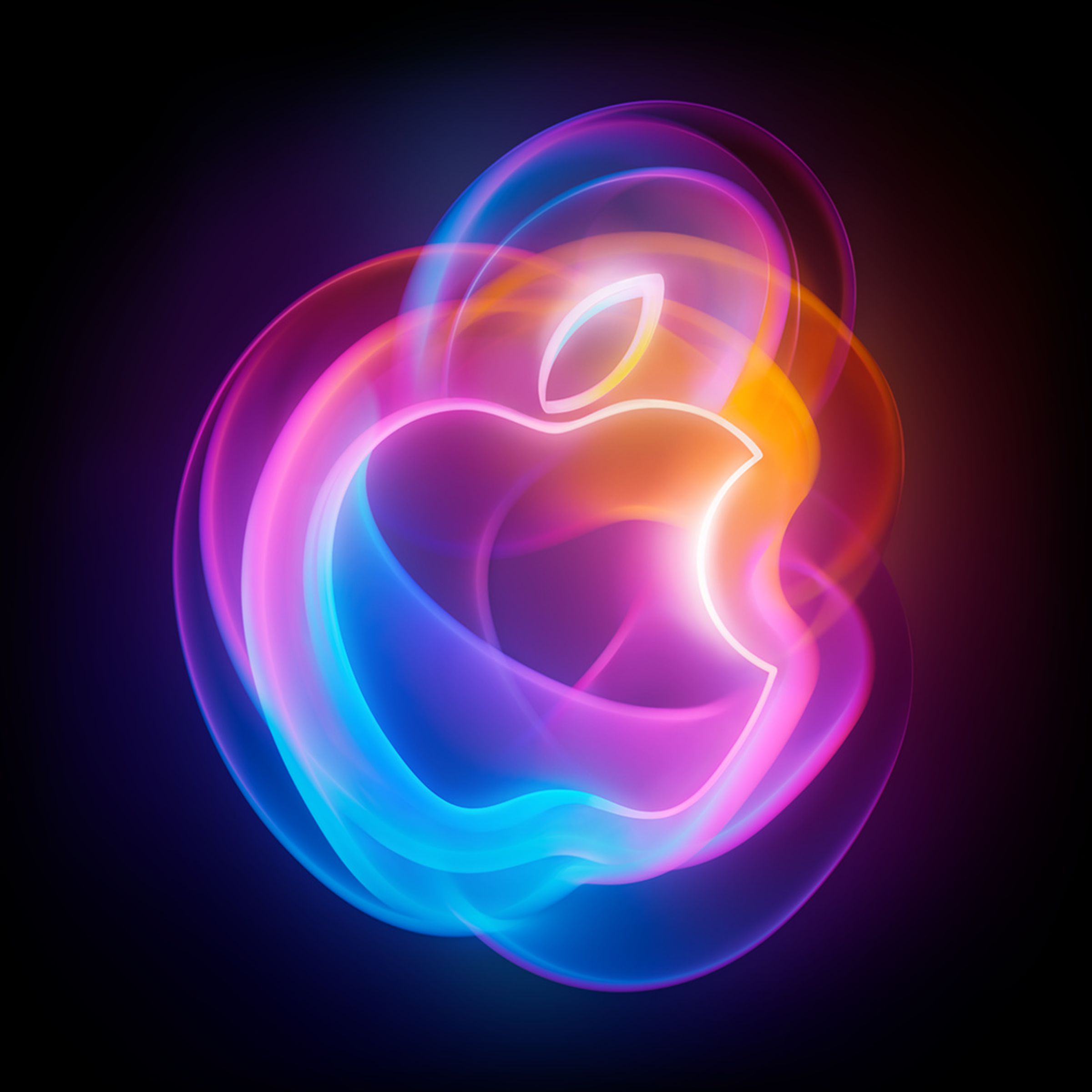 Picture of the Apple Glowtime event: a rainbow-colored Apple logo with rounded shapes overlapping behind and inside of it.