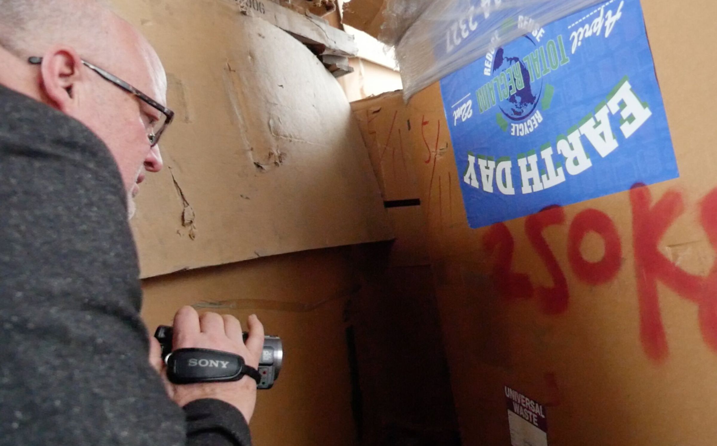 Jim Puckett discovers boxes bearing Seattle-based recycler Total Reclaim’s logos in an e-waste dismantling facility in rural Hong Kong.