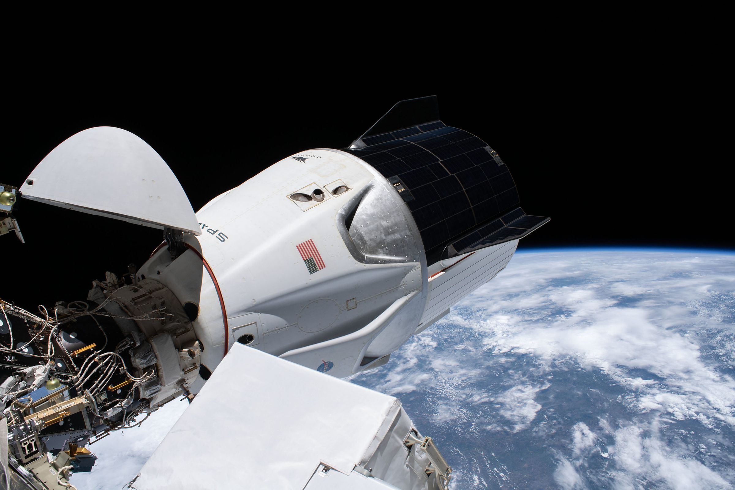 SpaceX’s Crew Dragon “Resilience” spacecraft is seen docked to the International Space Station’s Harmony module.
