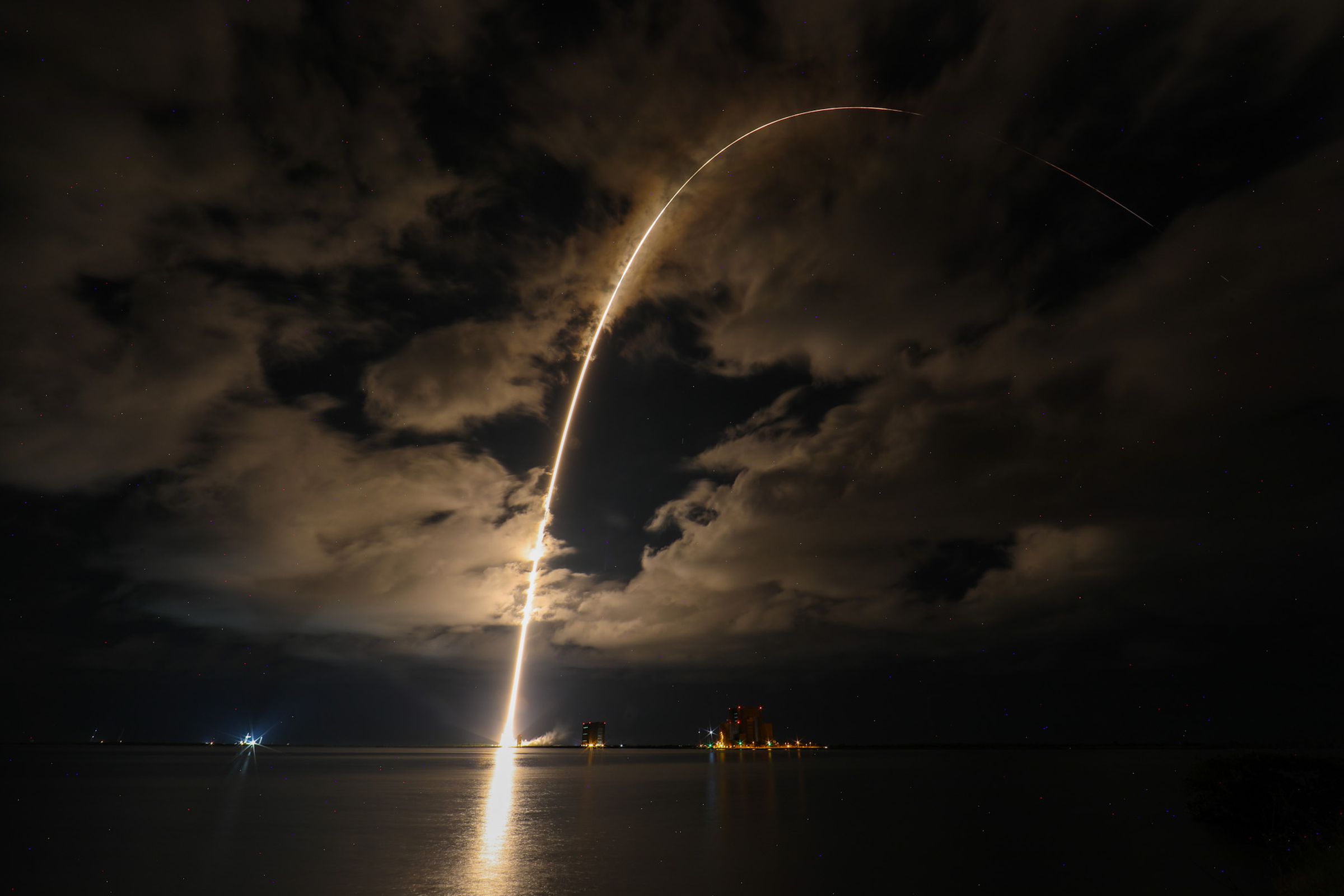 An Atlas V launching at night. Project Kuiper has bought nine launches of Atlas V rockets to send its satellites into orbit.