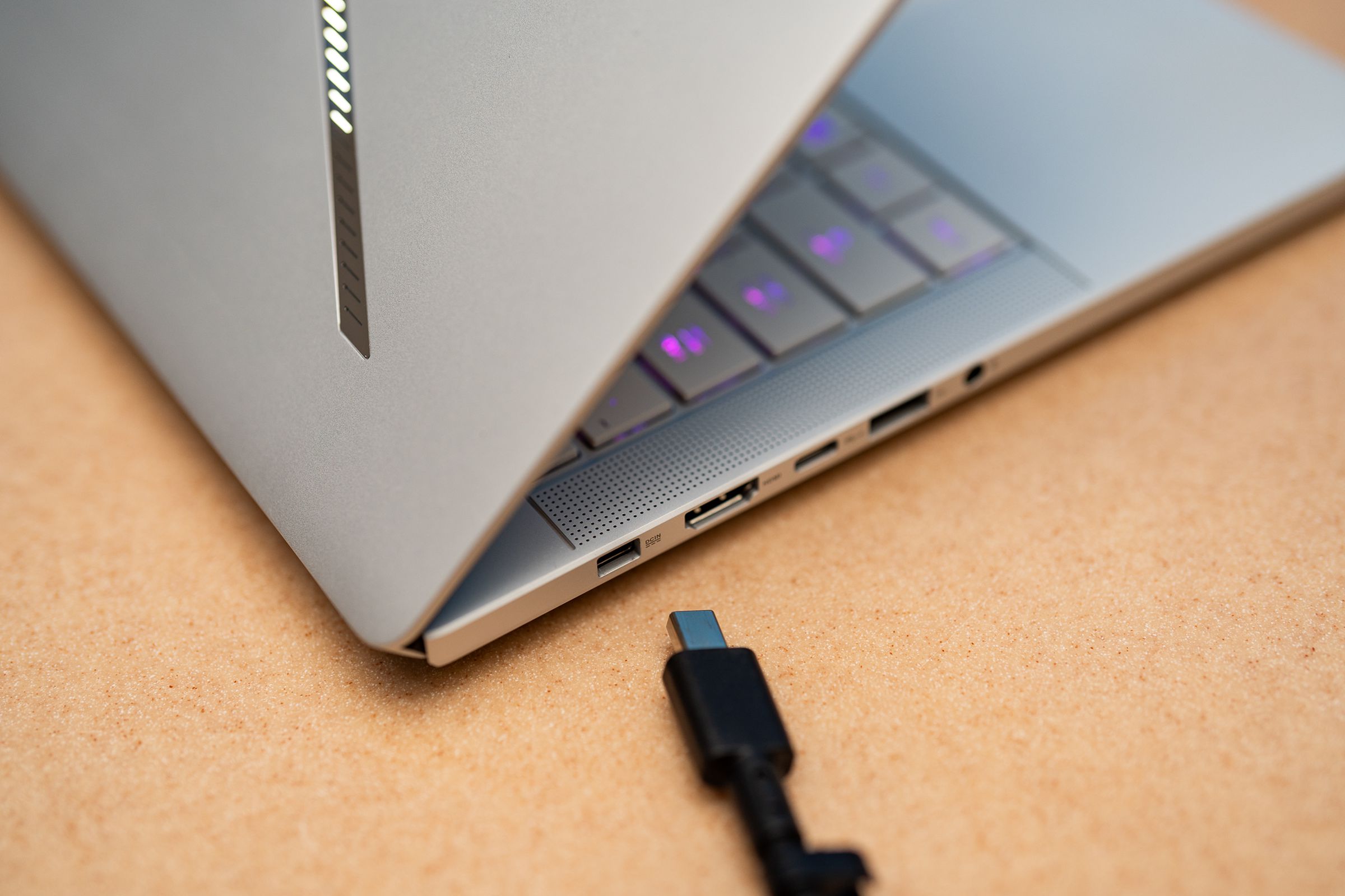 The new charging port almost looks like an oversized USB-C, but it’s Asus’ own proprietary (and also reversible) connector. USB-PD charging is available as well.