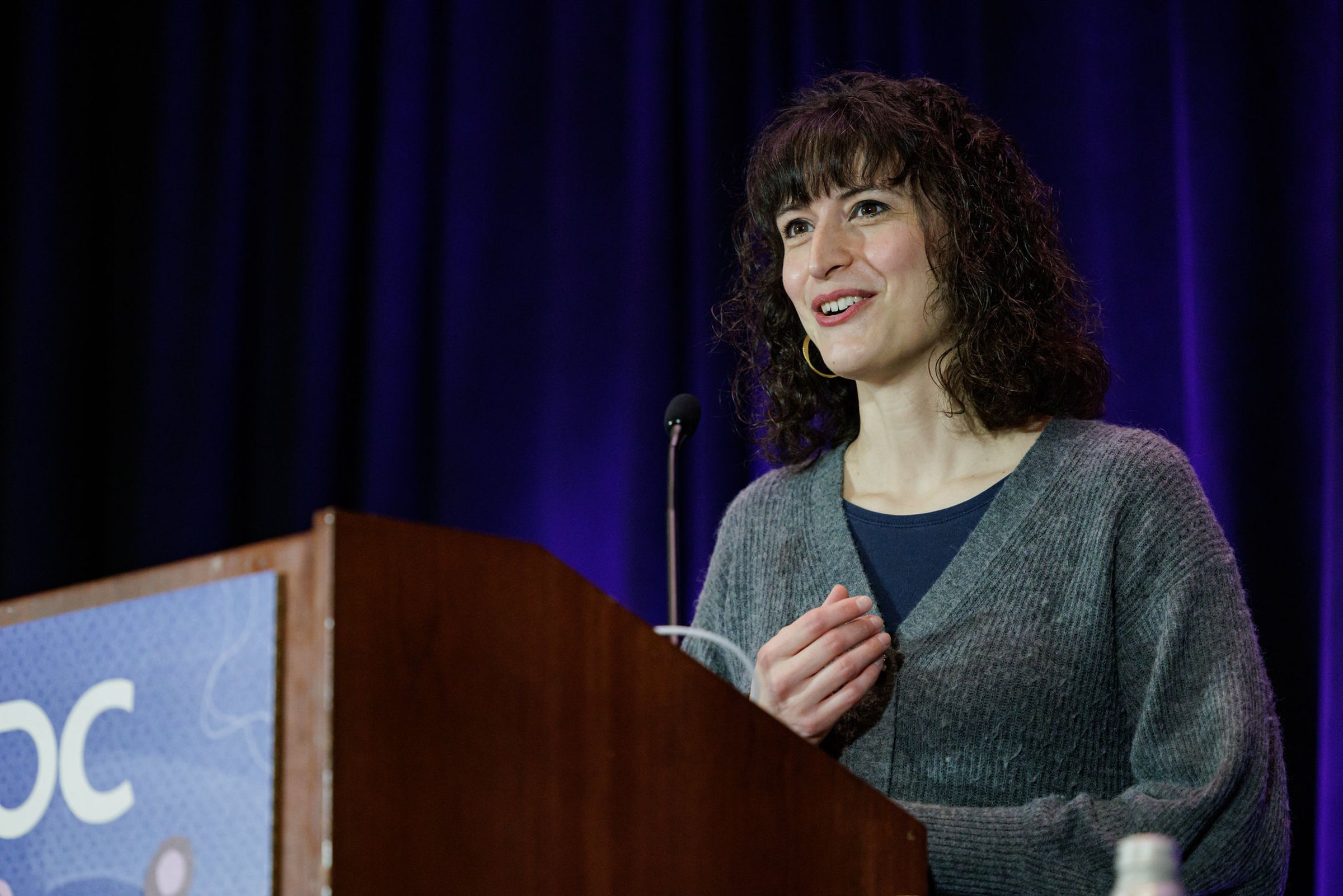 A photo of Wordle producer Zoe Bell speaking at the 2023 Game Developers Conference in San Francisco.