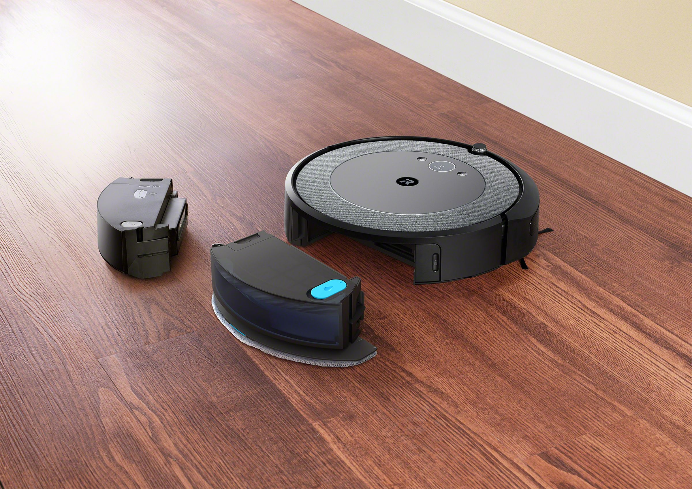 The i5 and j5 models use swappable bins for mopping.