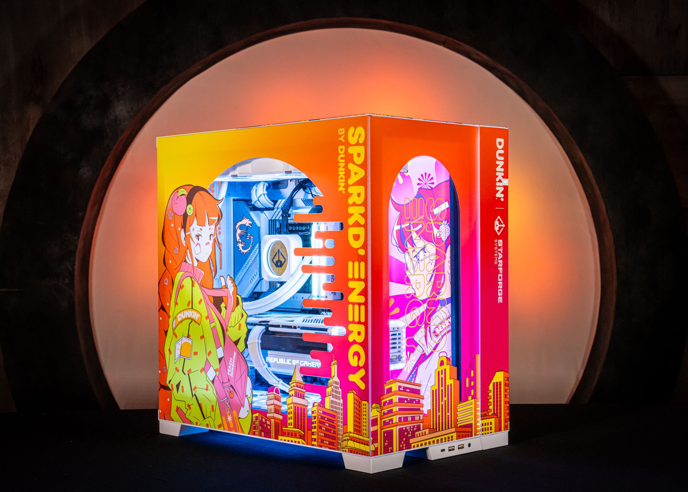 The Dunkin’-themed gaming PC from Starforge systems with a bright pink and yellow color scheme and waifu artwork.