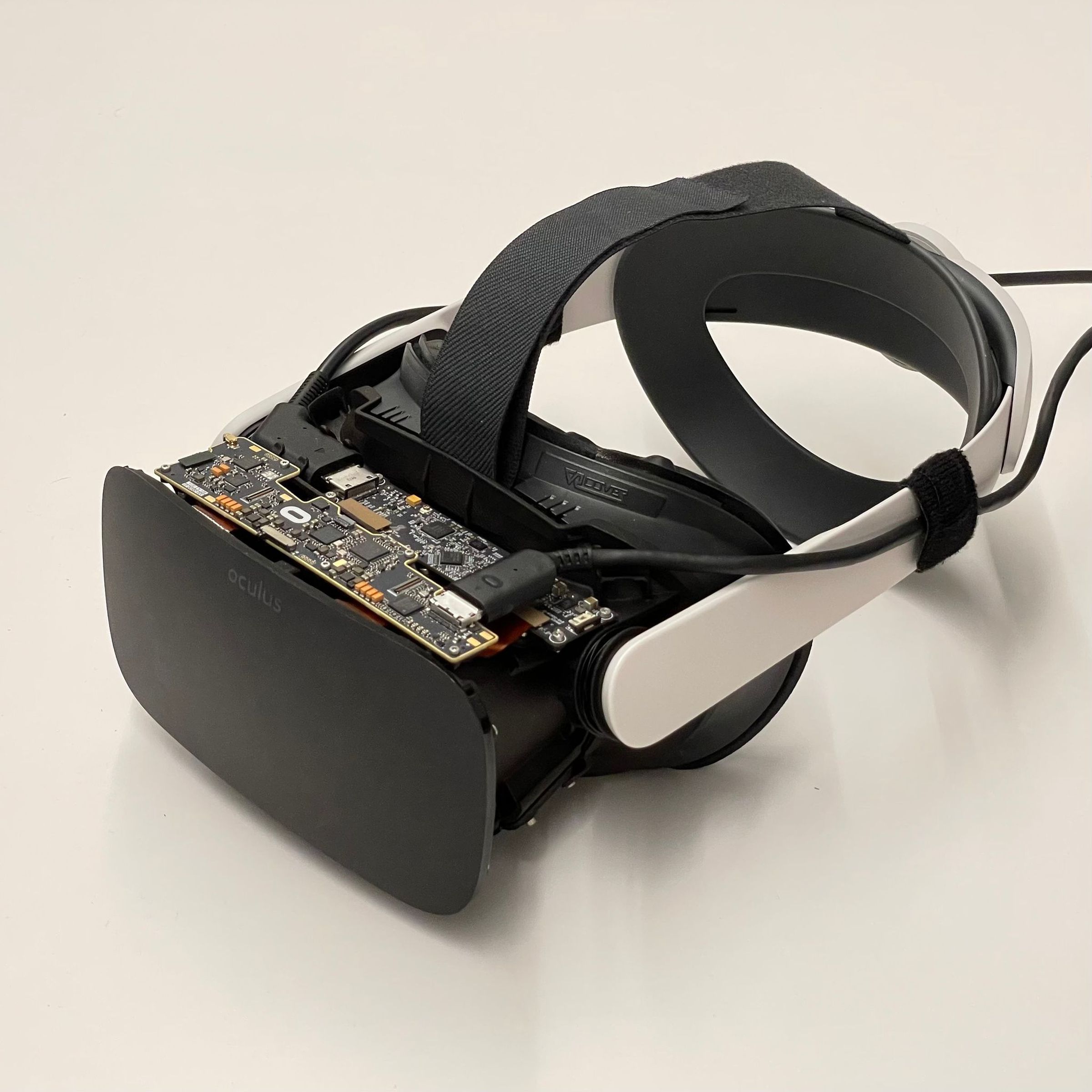 A black VR headset with a custom high-resolution display.