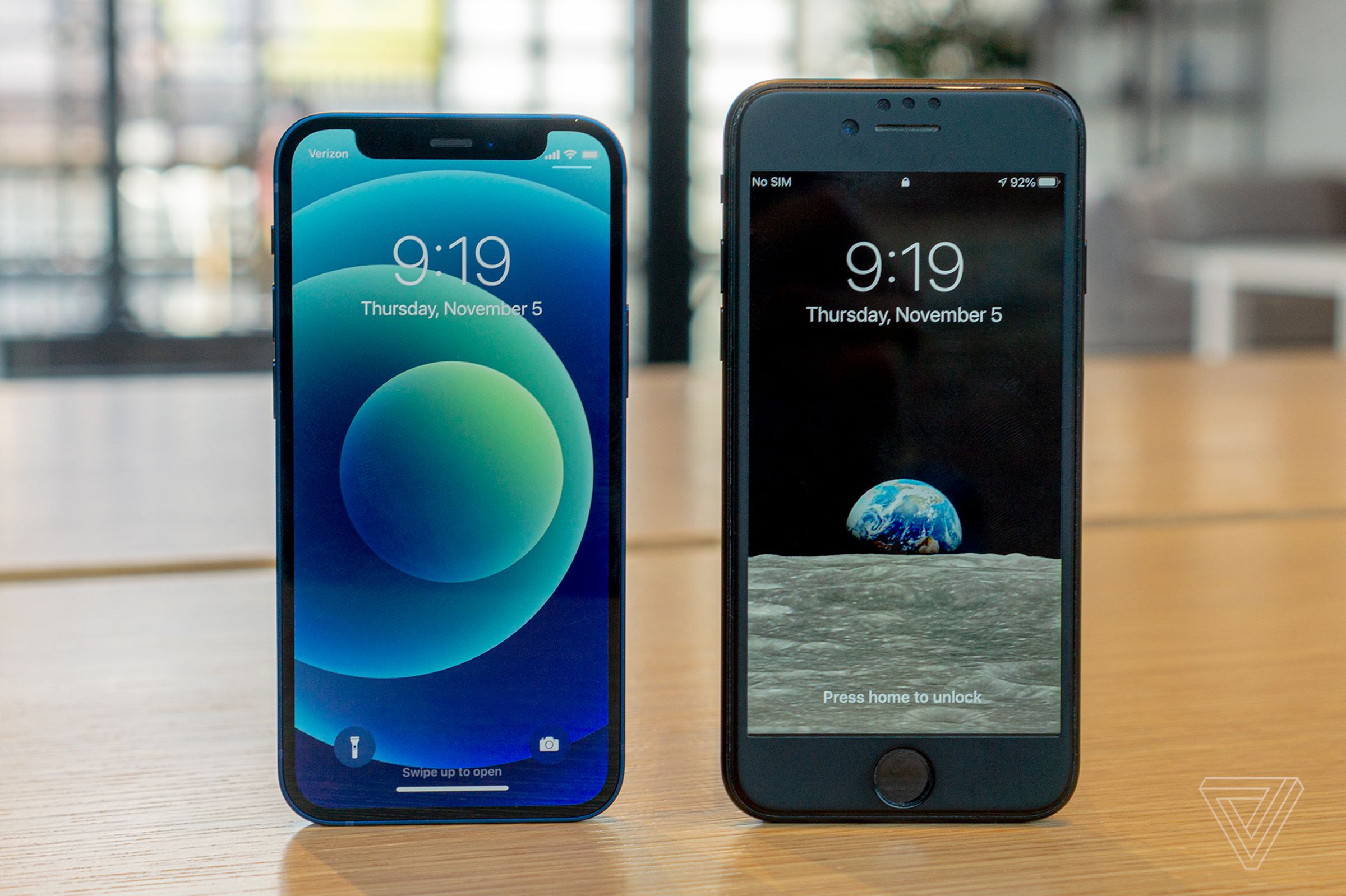 <em>The iPhone 12 mini (left) and iPhone 7 (right).</em>
