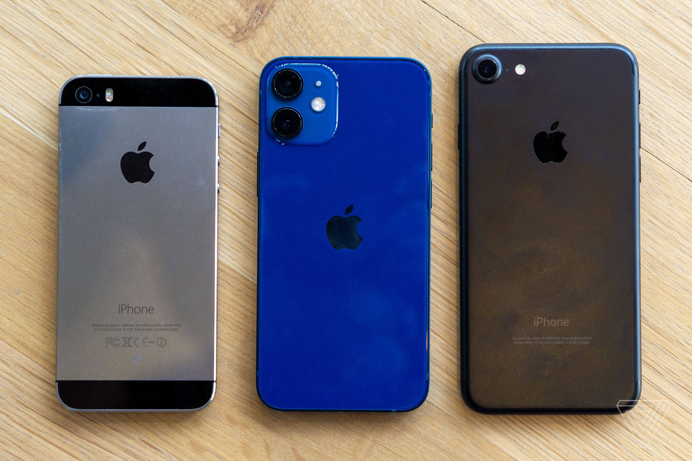 From left to right: the iPhone 5S, iPhone 12 mini, and iPhone 7.