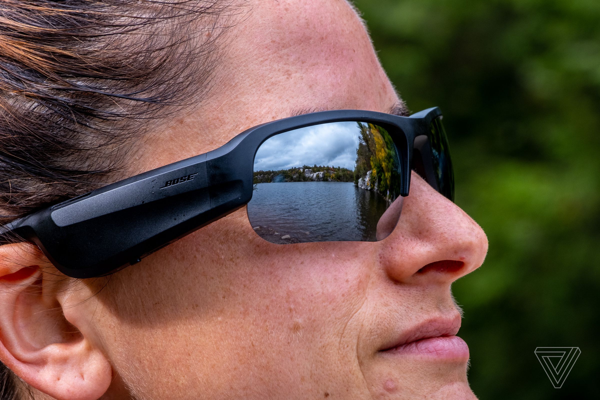 A photo of Bose’s Frames Tempo audio sunglasses on a woman’s face.