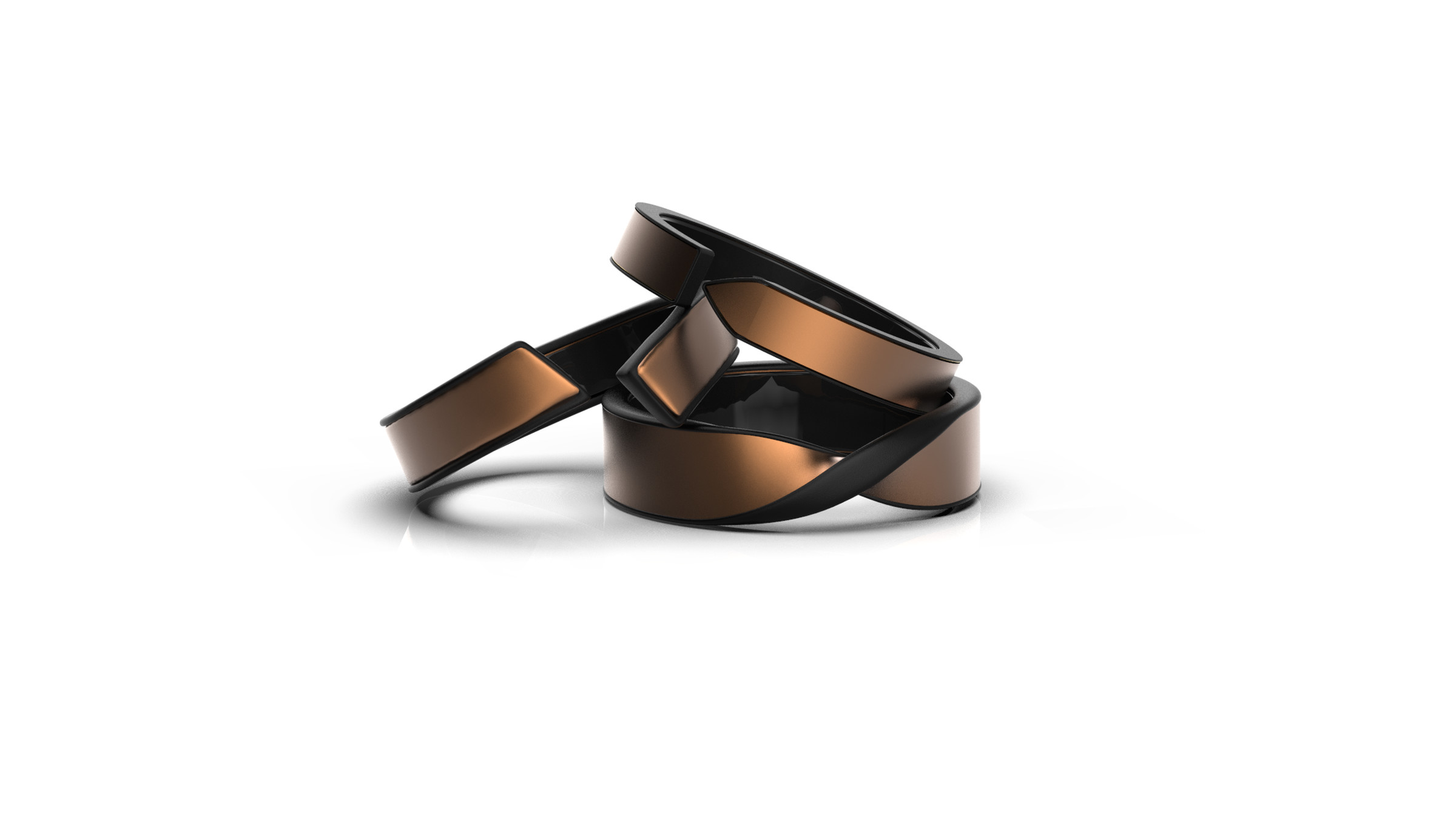 Three copper Movano Rings stacked on top of each other