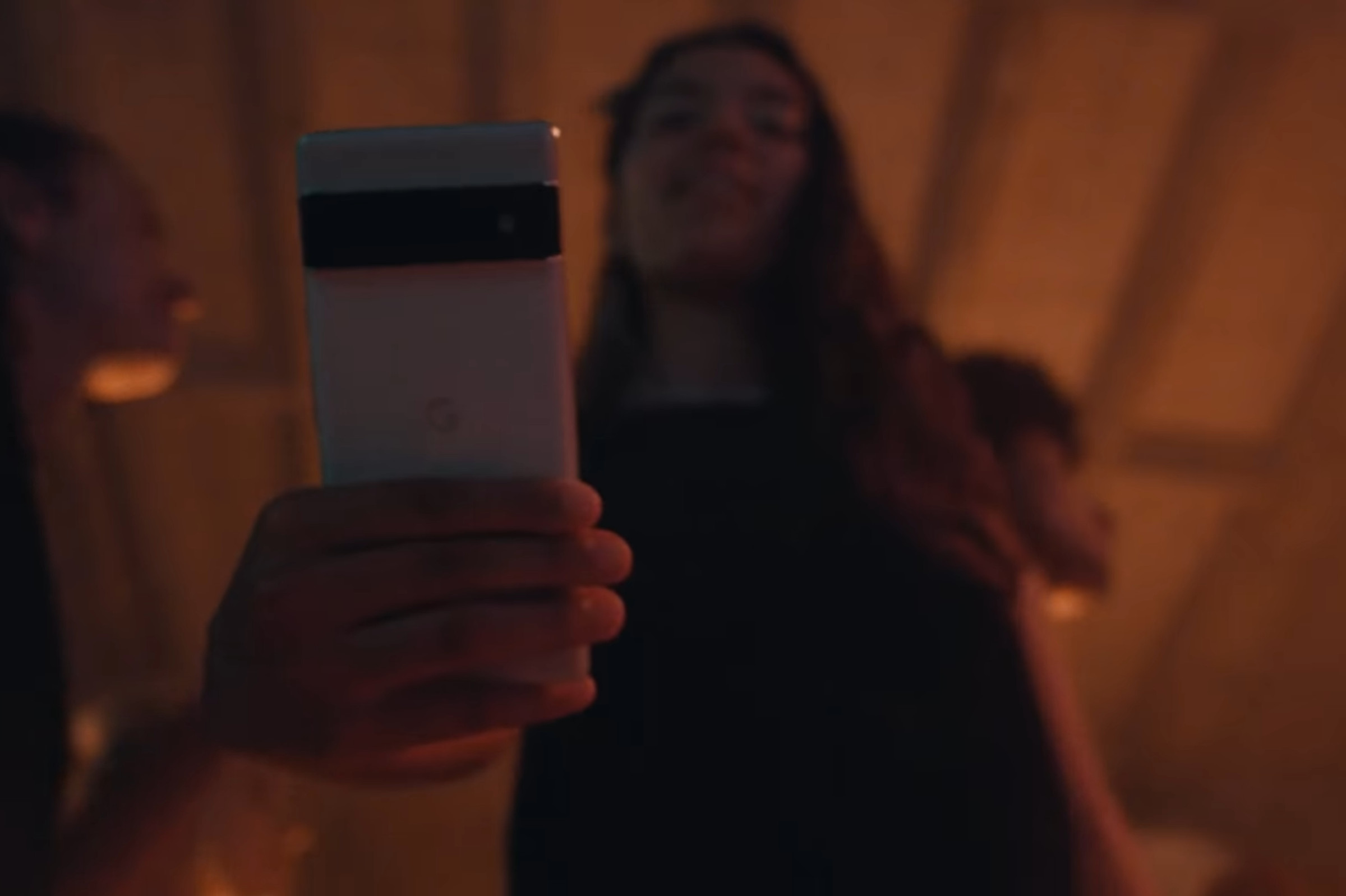 A still from the teaser showing the rear of the phone.