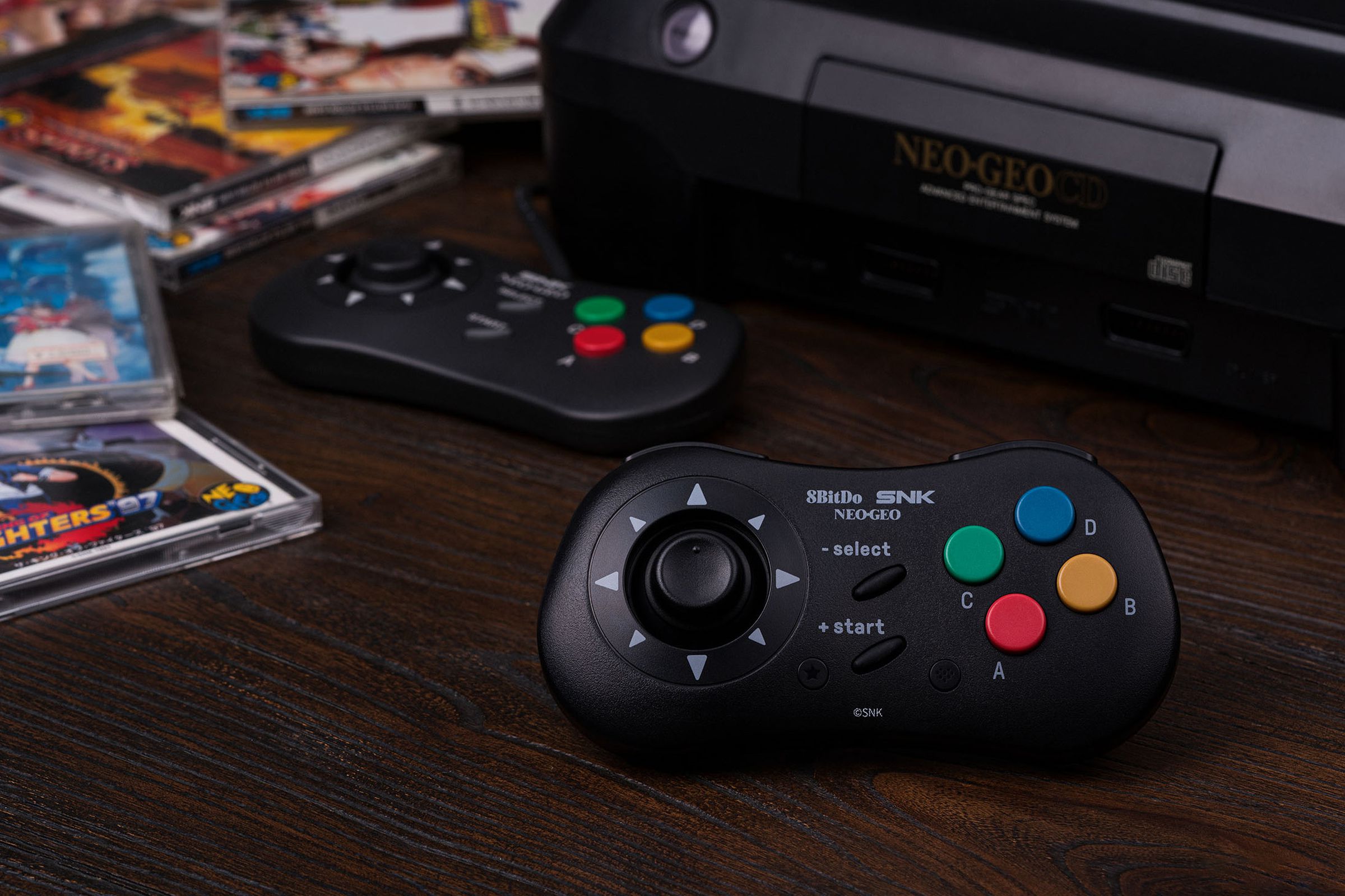 8BitDo's latest controller is a wireless take on the Neo Geo CD's