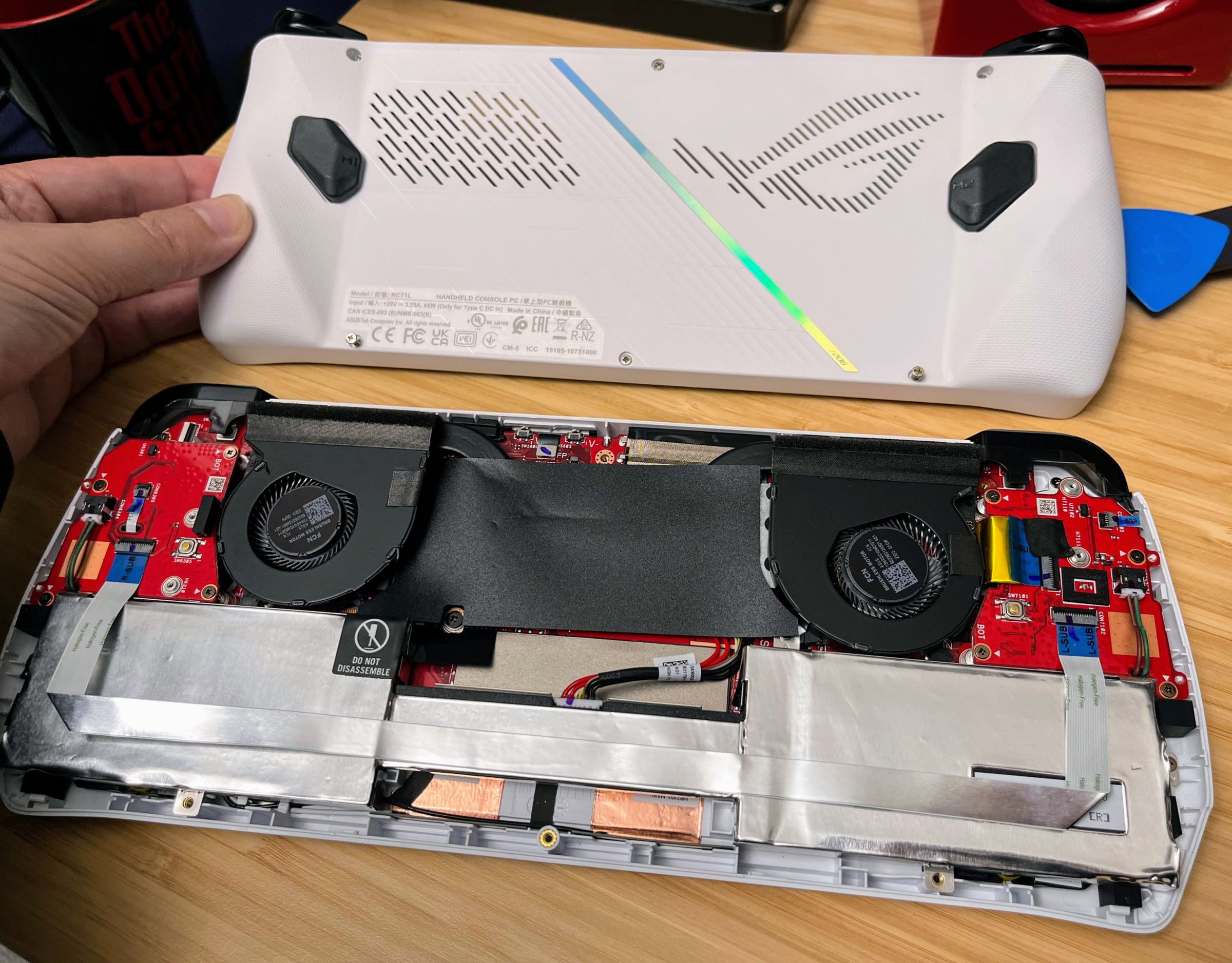 Inside the ROG Ally. Asus says it’s looking into selling replacement batteries.