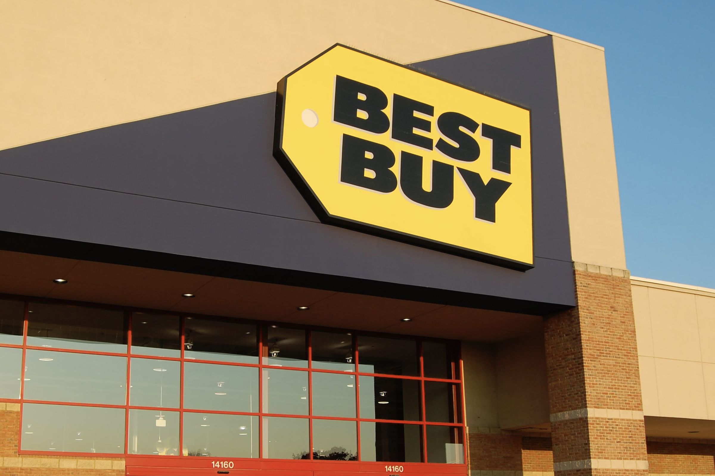 Best Buy storefront with big yellow best buy logo