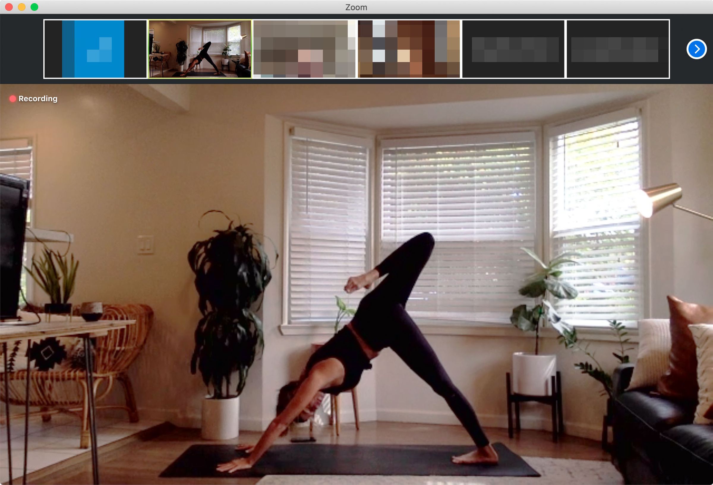 Katie Baki leads a yoga class over Zoom.