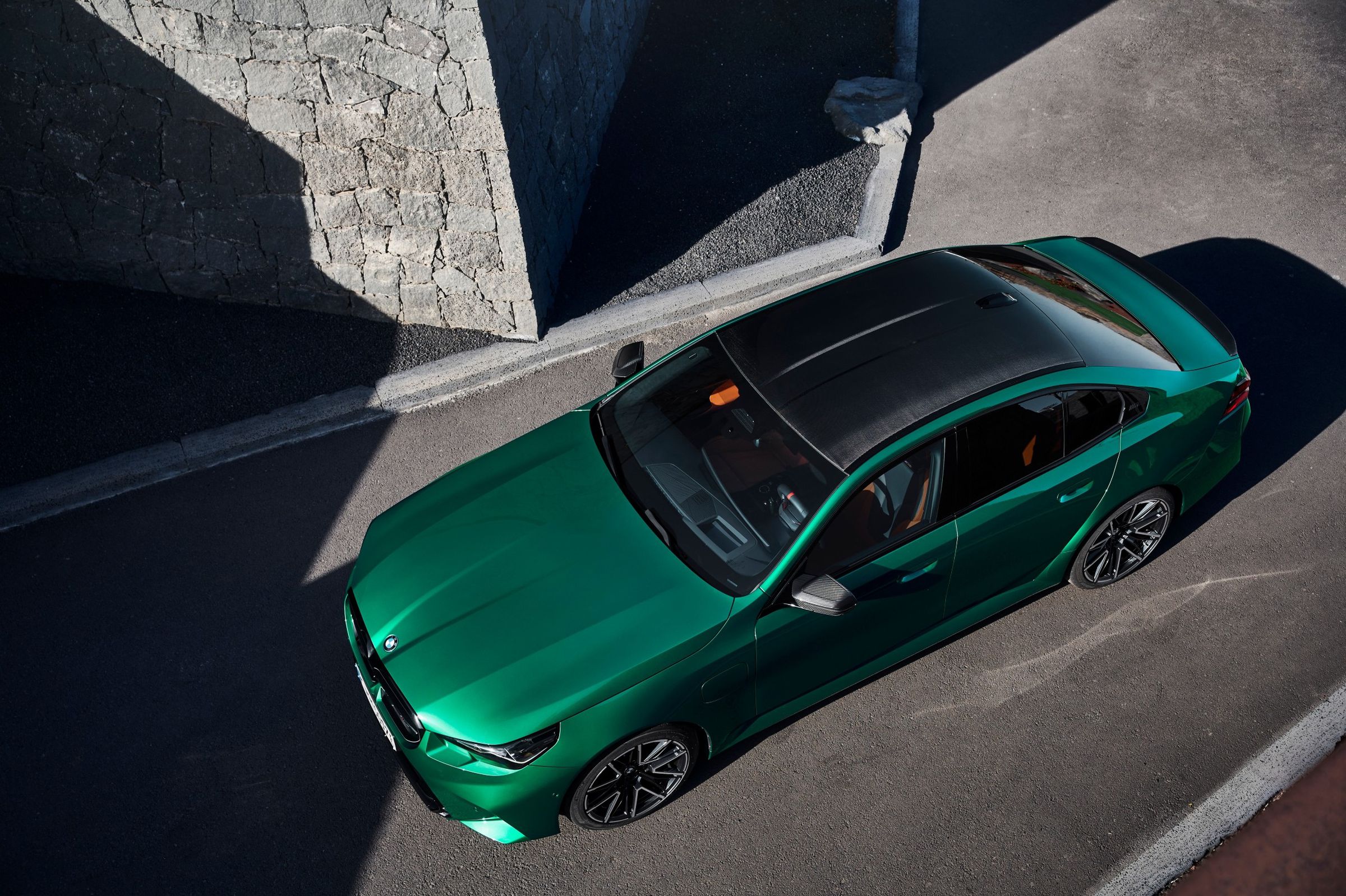 <em>The 2025 BMW M5 gets a plug.</em>