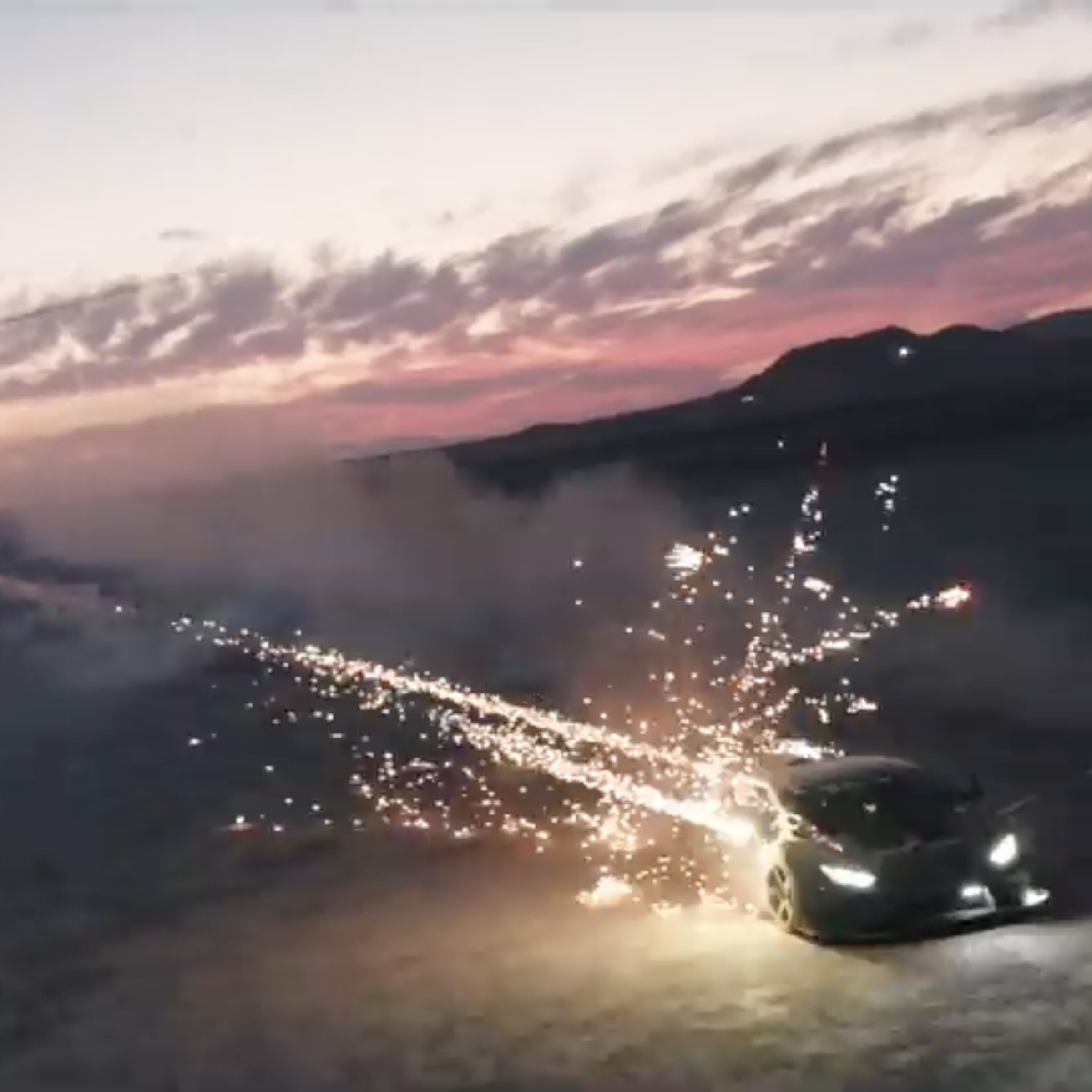 A screenshot from Alex Choi’s video showing a helicopter shooting fireworks at a Lamborghini.