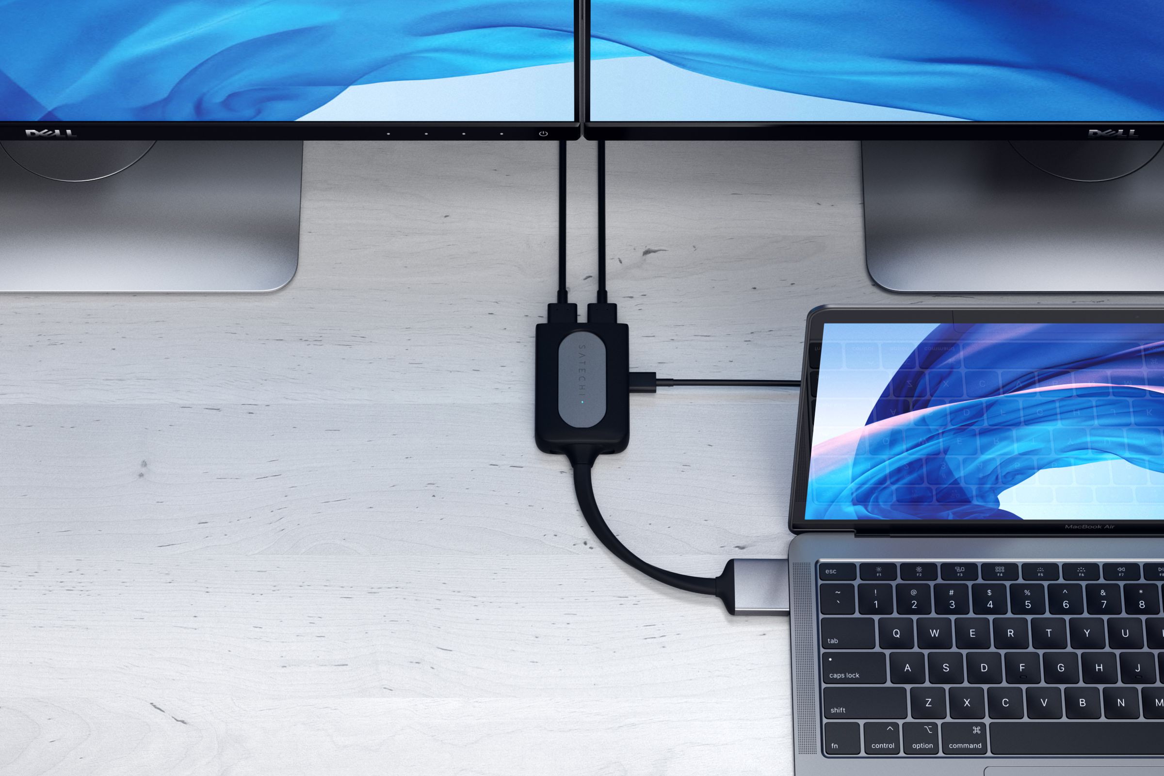 One of Satechi’s USB-C hubs can provide 4K 60Hz signal to two monitors.
