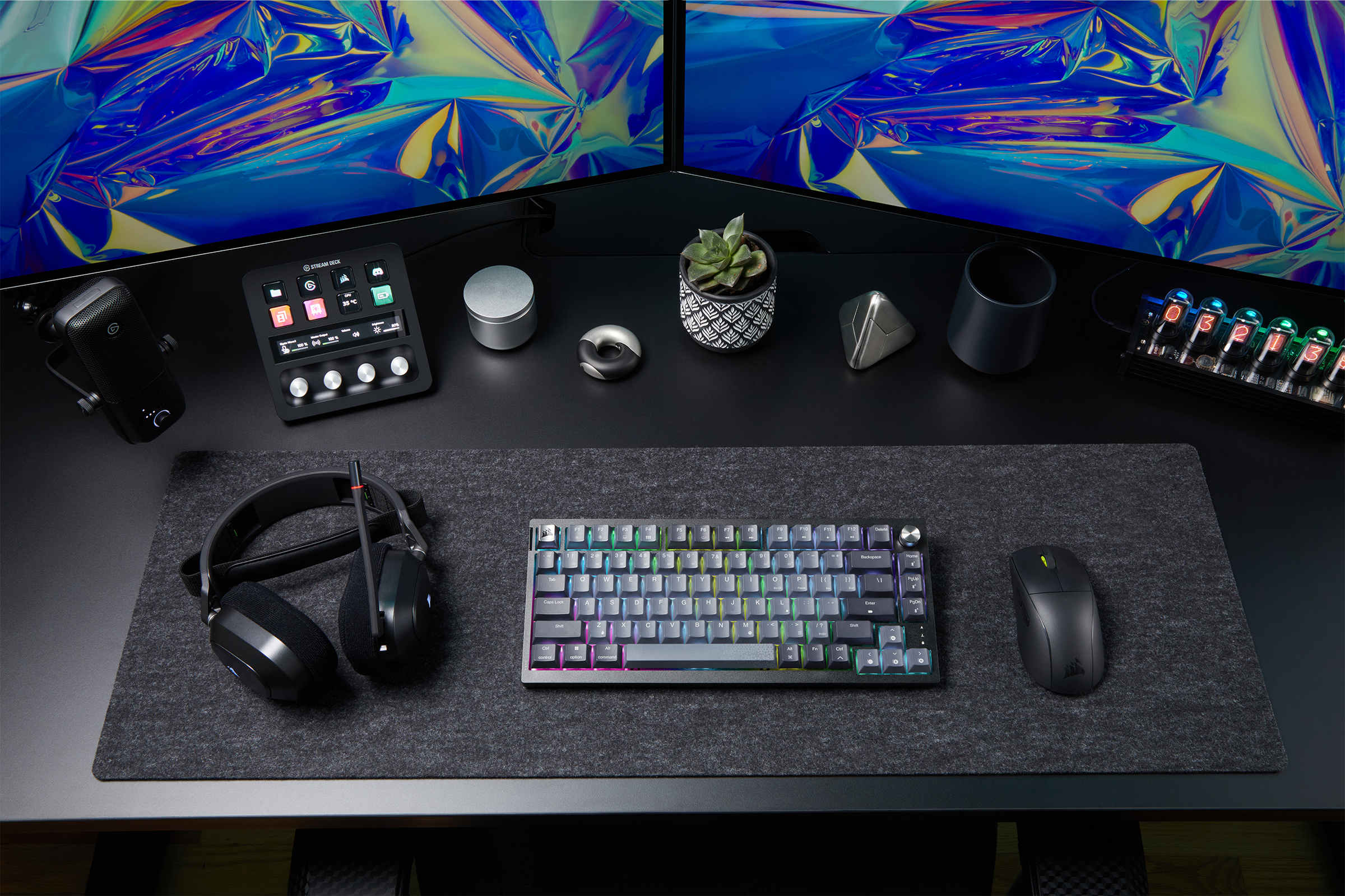 K65 Plus Wireless on a desk surrounded by Corsair accessories.