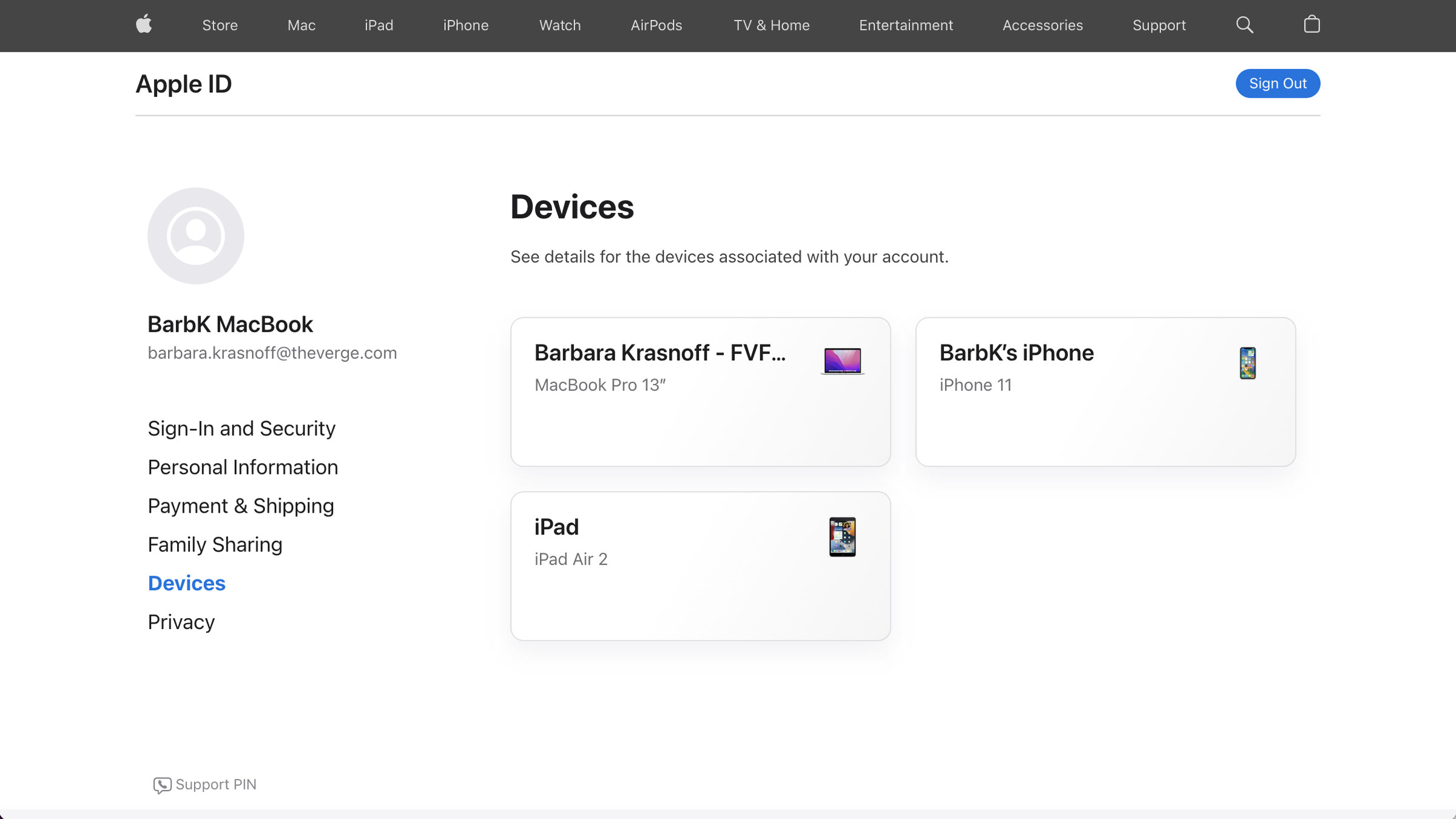 Apple ID in upper left corner, BarbK MacBook heading off left-hand column, title Devices with three boxes below it for a Macbook, an iPhone and an iPad.