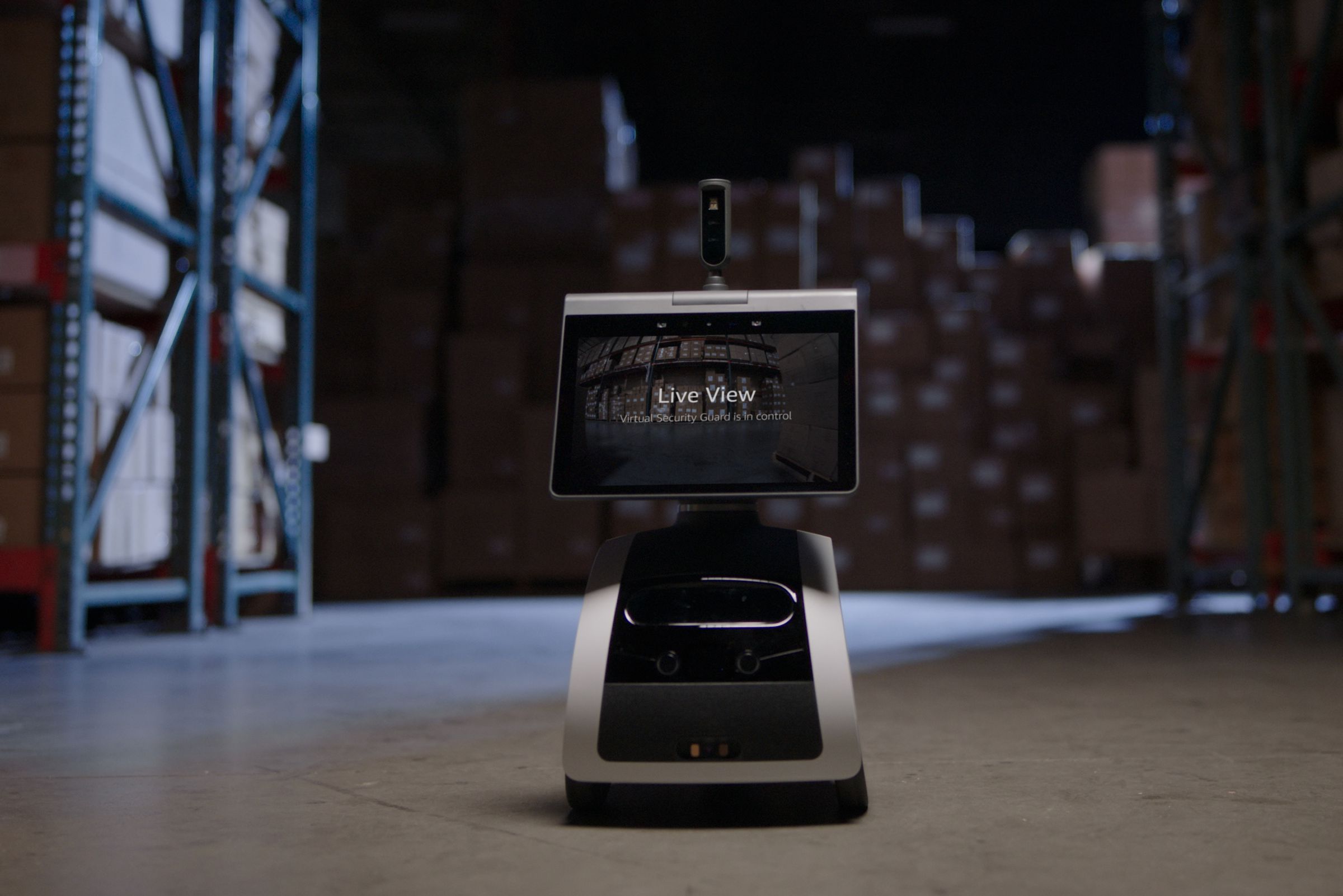 A patrolling Amazon Astro robot running with Ring’s new Virtual Security Guard feature.