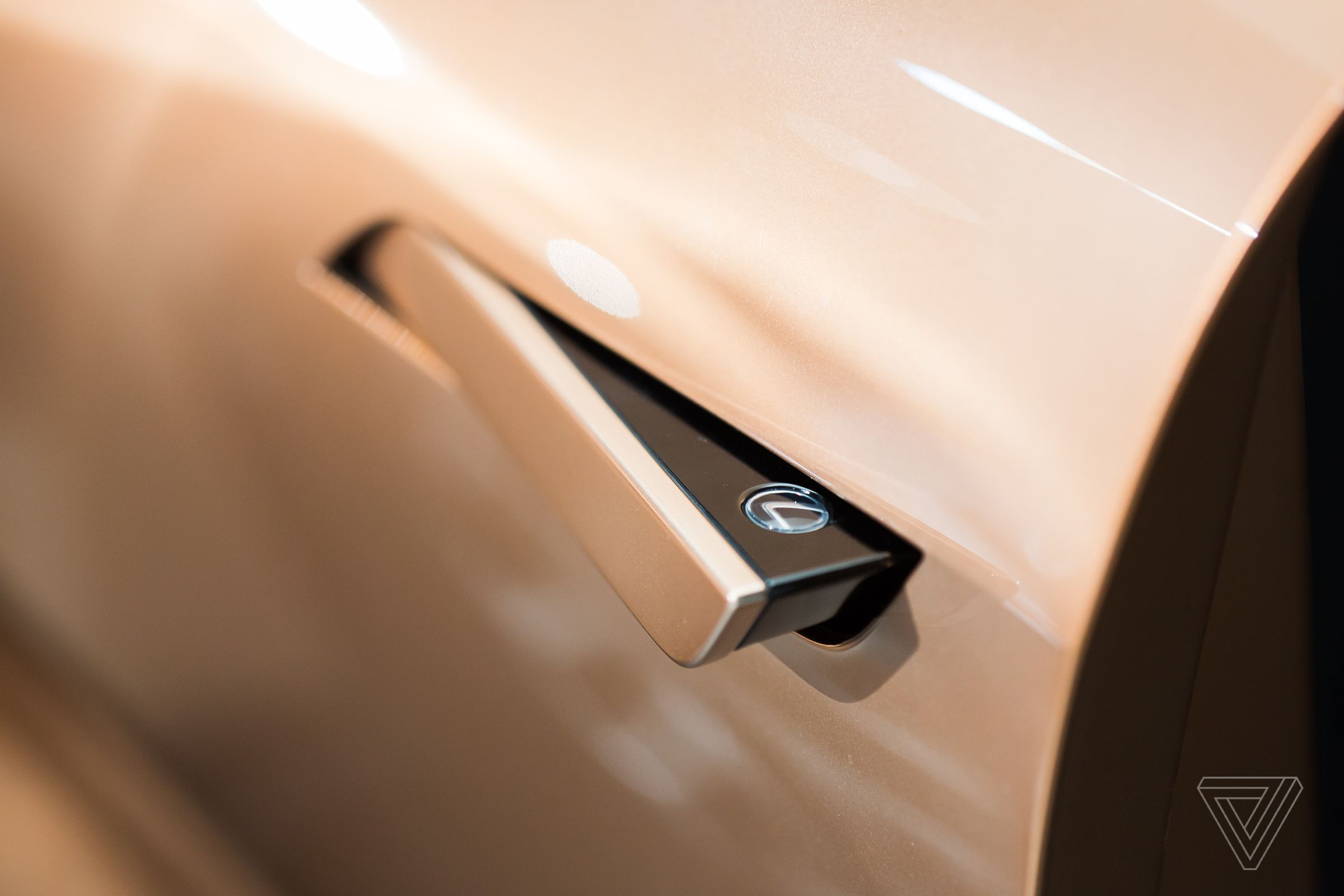 The Lexus LF-1 Limitless concept’s door handles pop out of the SUV’s smooth frame. See more photos here.
