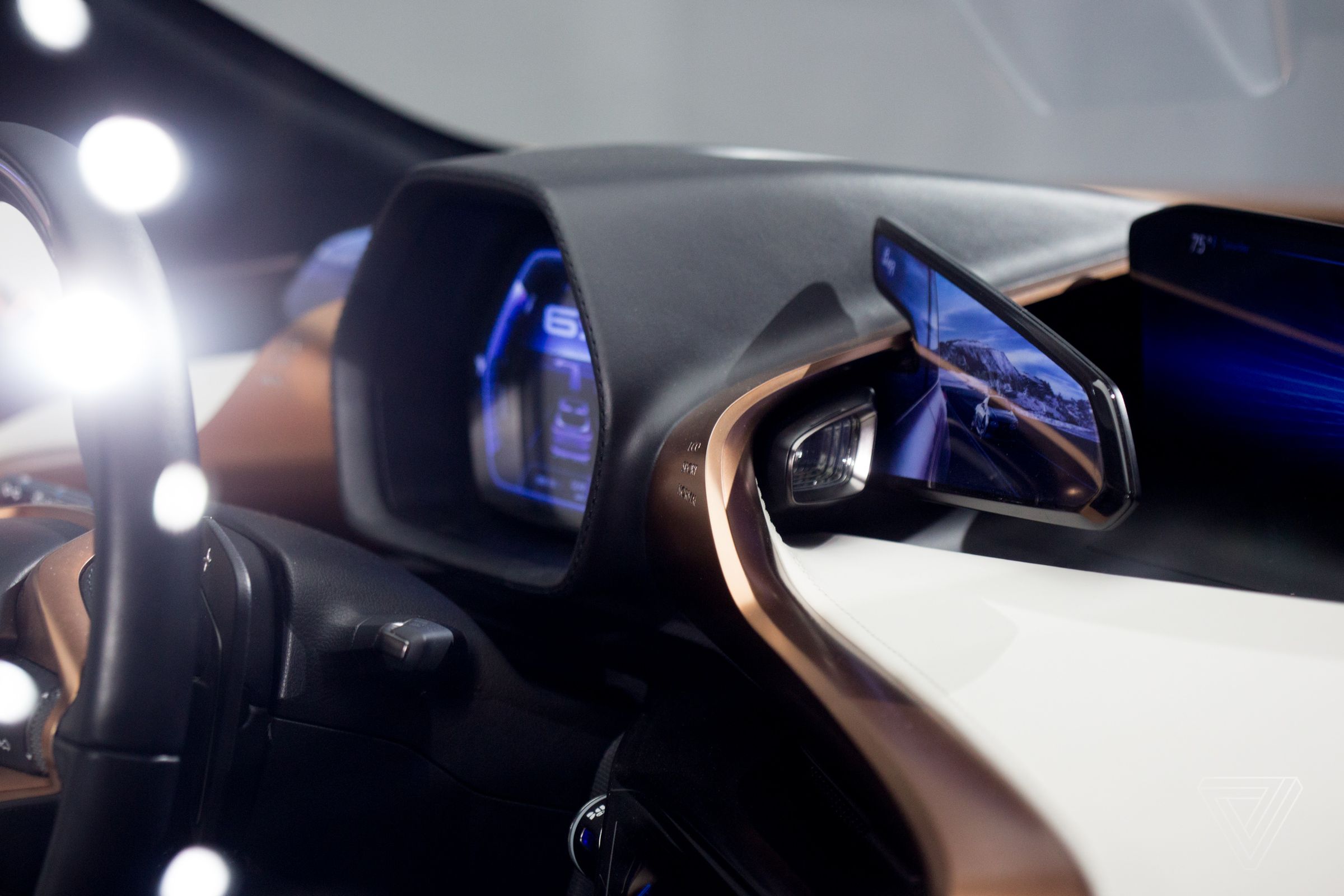 The Lexus LF-1’s interior features a handful of triangular screens. See more photos here.