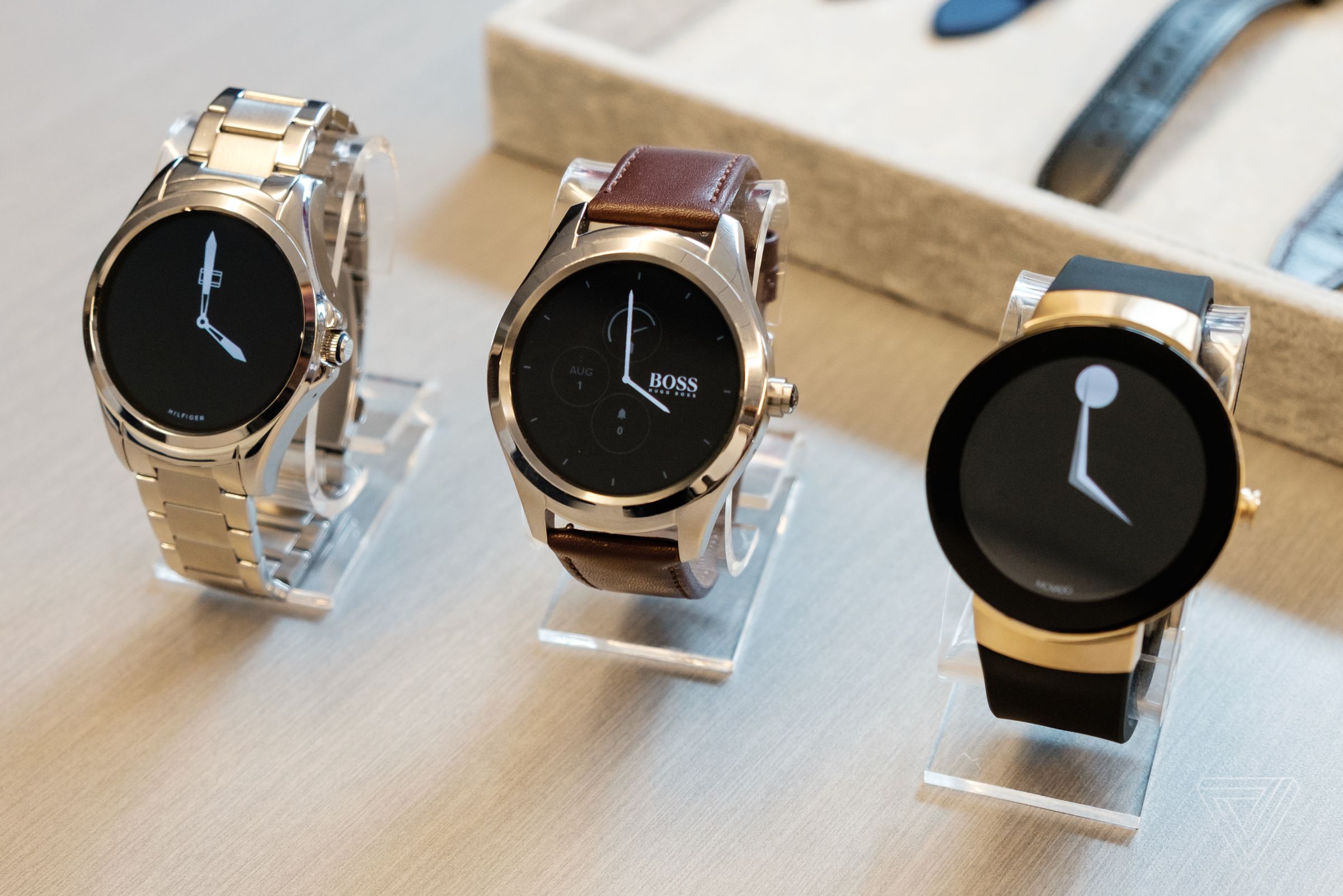 Tommy Hilfiger, Hugo Boss, and Movado Android Wear smartwatches.