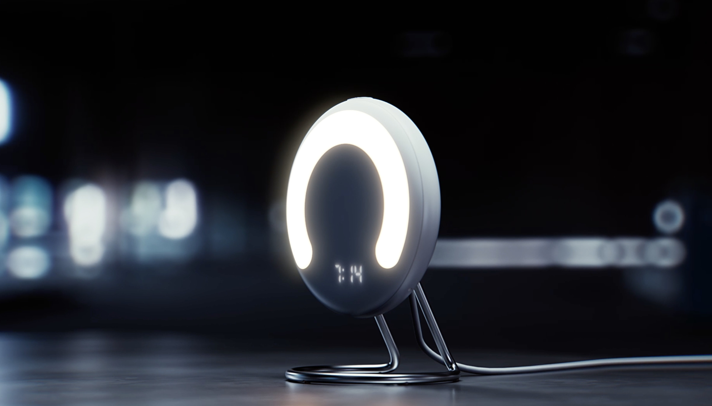 Image of the Rise, a circular device with a three-quarter ring of LEDs, and a small clock at the bottom.
