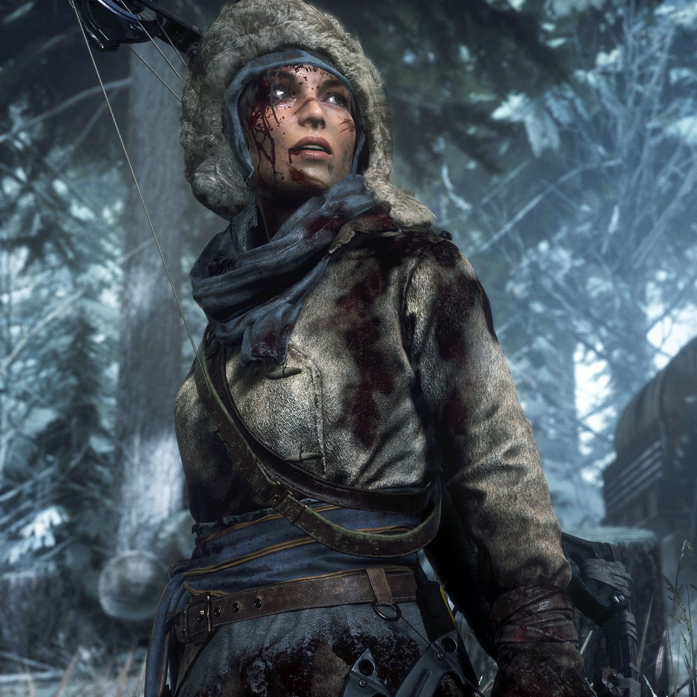 Screenshot from Rise of the Tomb Raider featuring Lara Croft covered in blood and bundled in a fur coat in a frozen wilderness