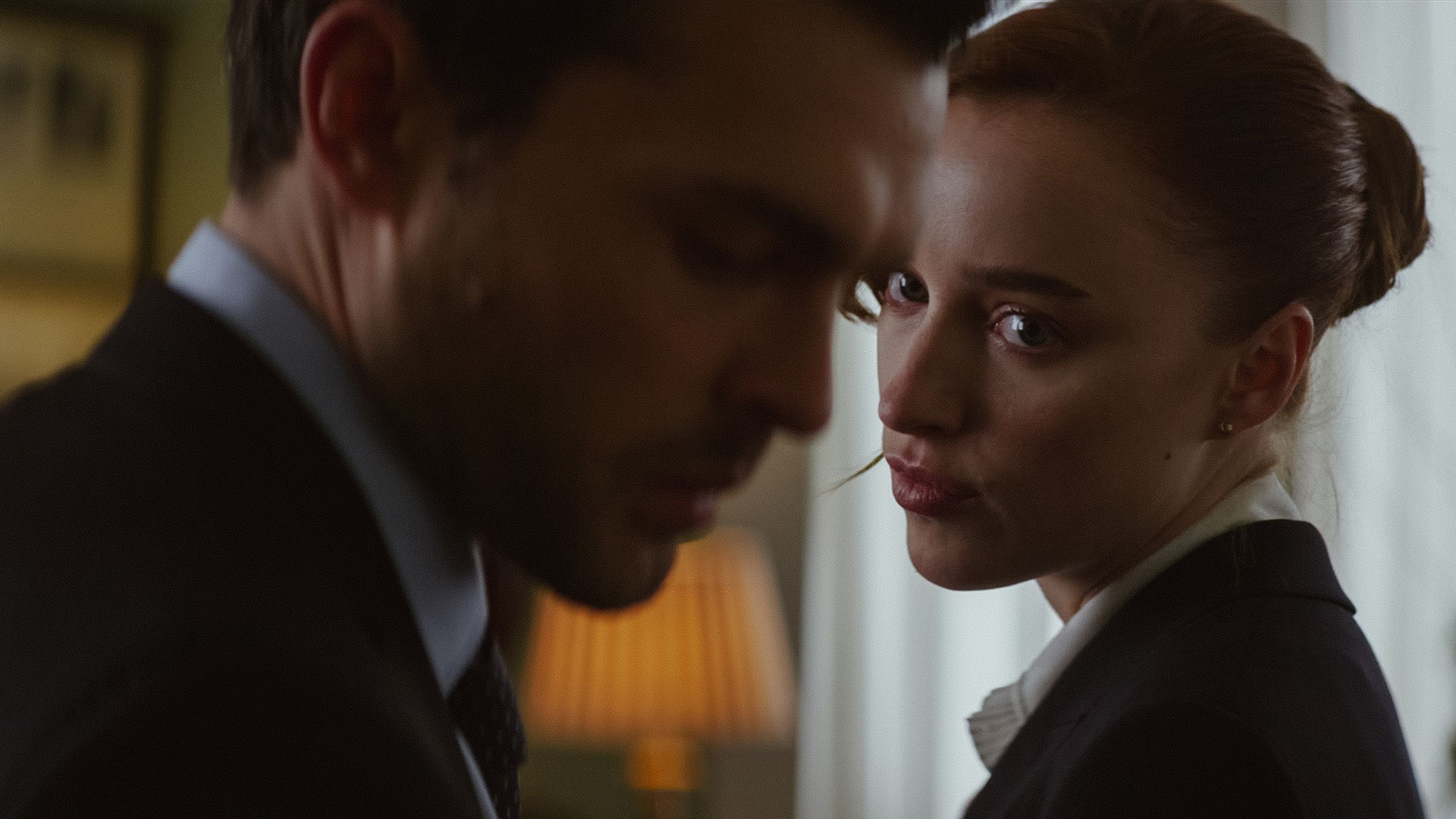 A still image of Phoebe Dynevor and Alden Ehrenreich in the film Fair Play.