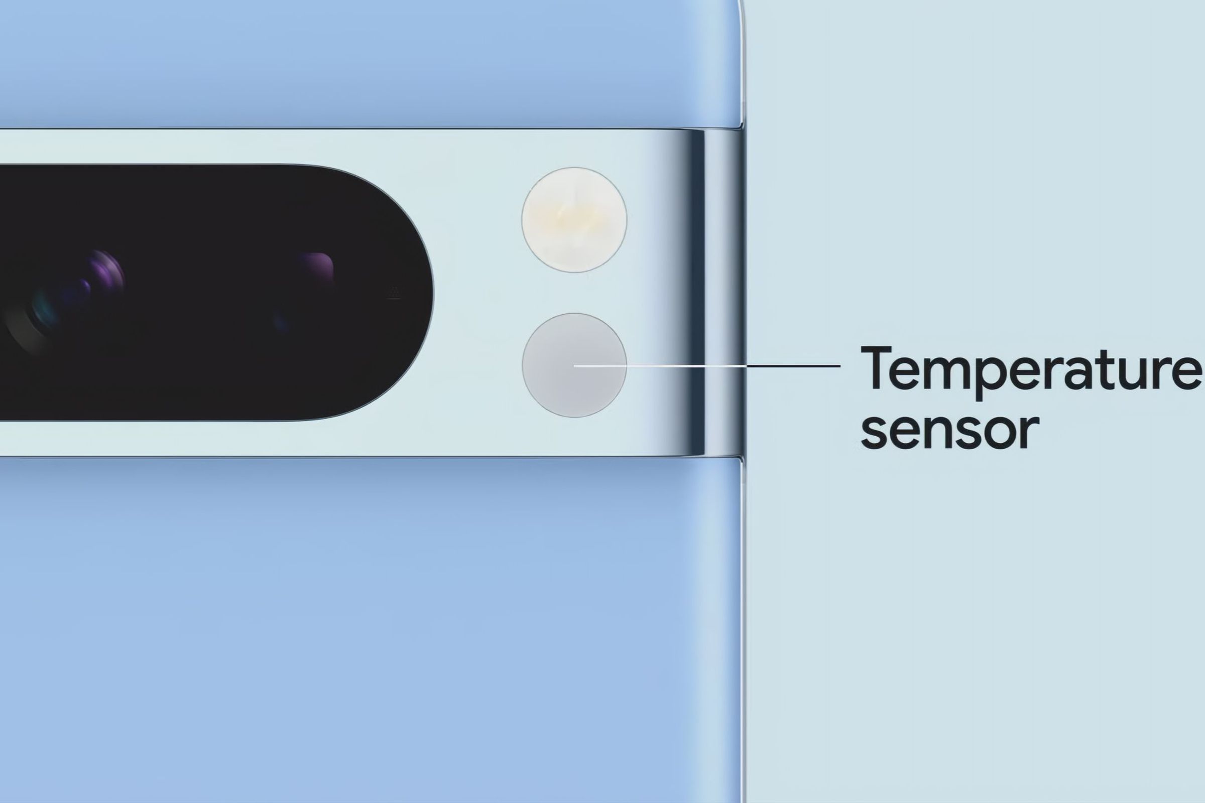A screencap from Google’s Pixel 8 launch event. A closeup of a blue Pixel 8 Pro, with a temperature sensor visible below the LED flash module on the right side of the camera bar. A line goes from the temperature sensor to the words “temperature sensor.”