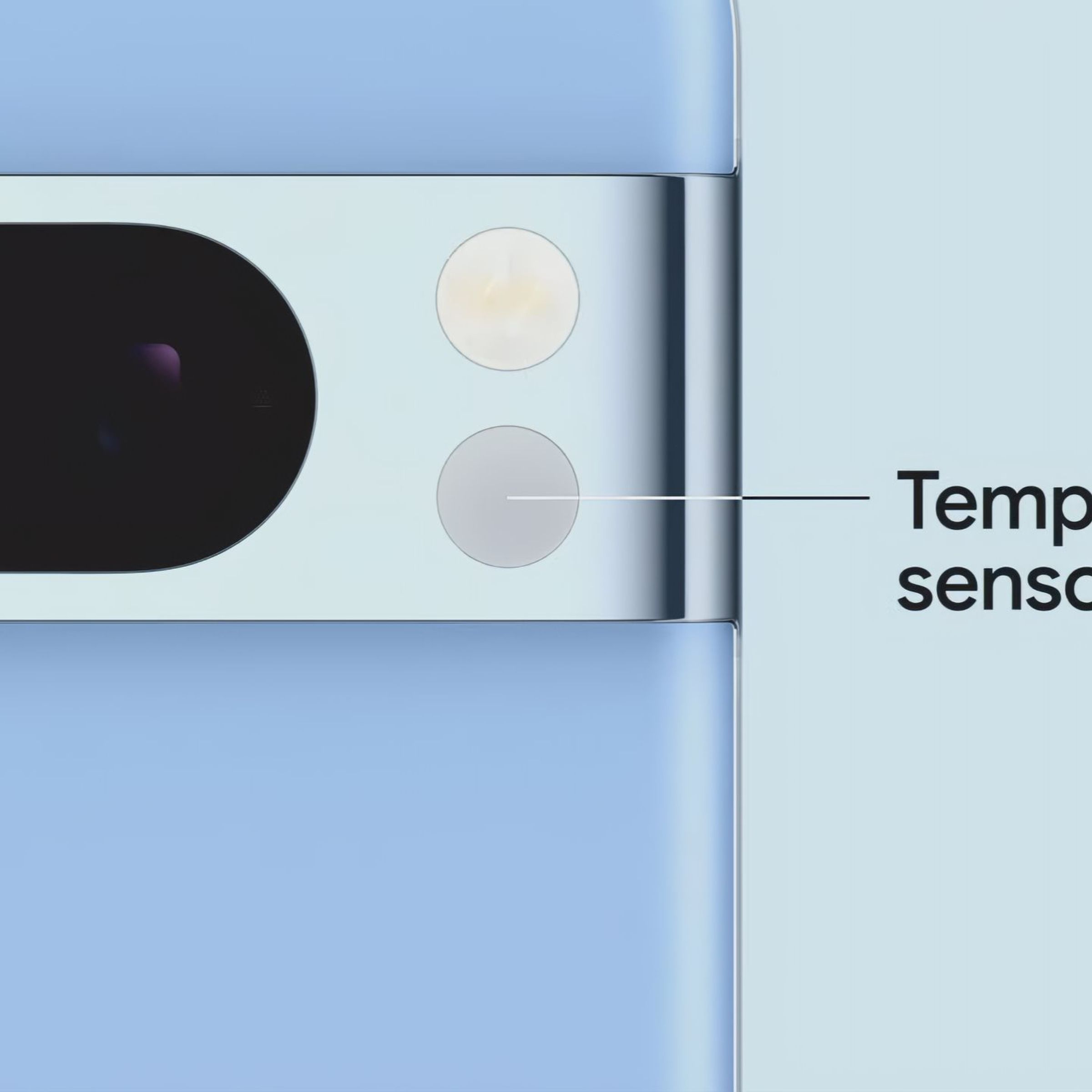 A screencap from Google’s Pixel 8 launch event. A closeup of a blue Pixel 8 Pro, with a temperature sensor visible below the LED flash module on the right side of the camera bar. A line goes from the temperature sensor to the words “temperature sensor.”
