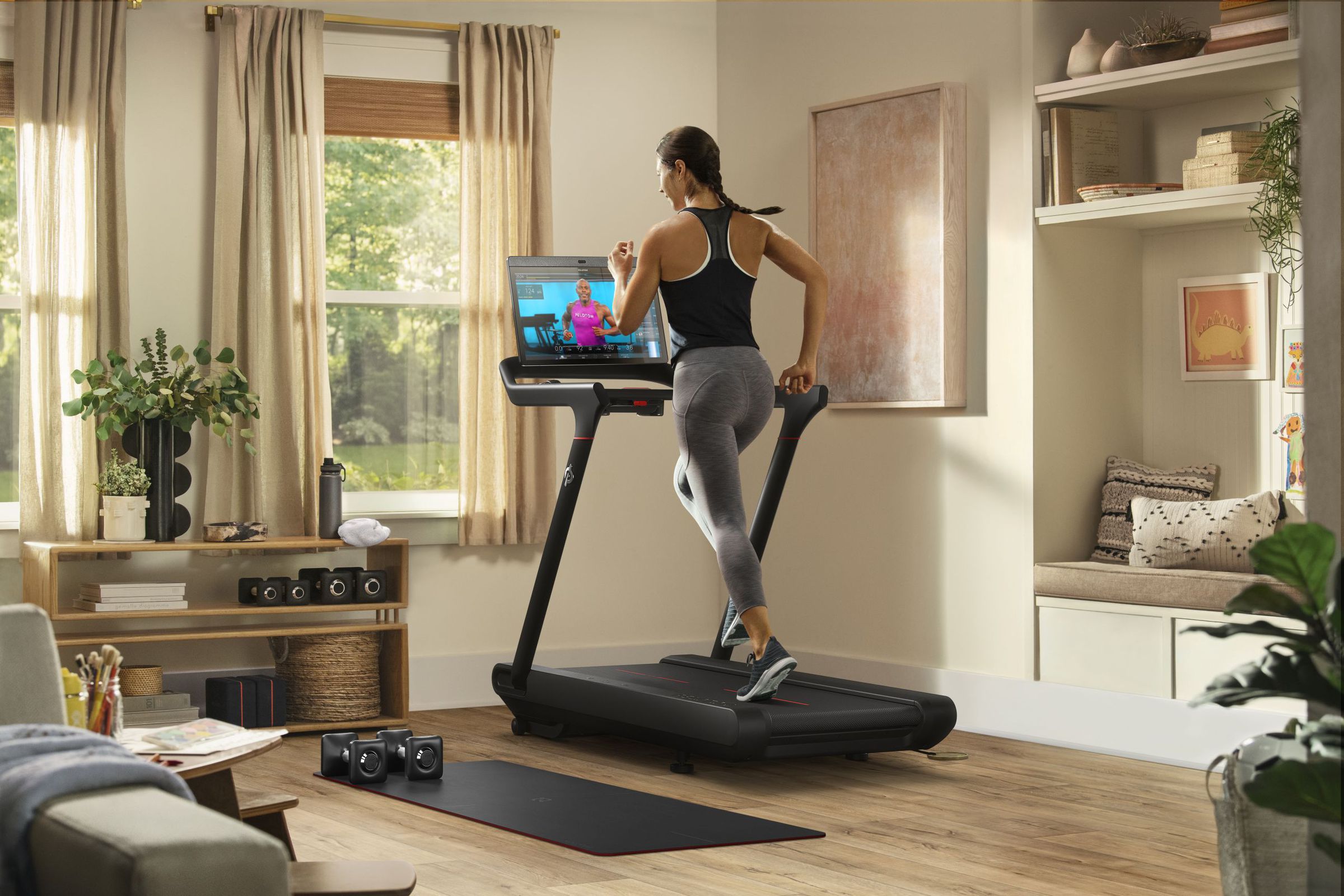The new treadmill is smaller than the original and drops the latter’s slatted belt design. 