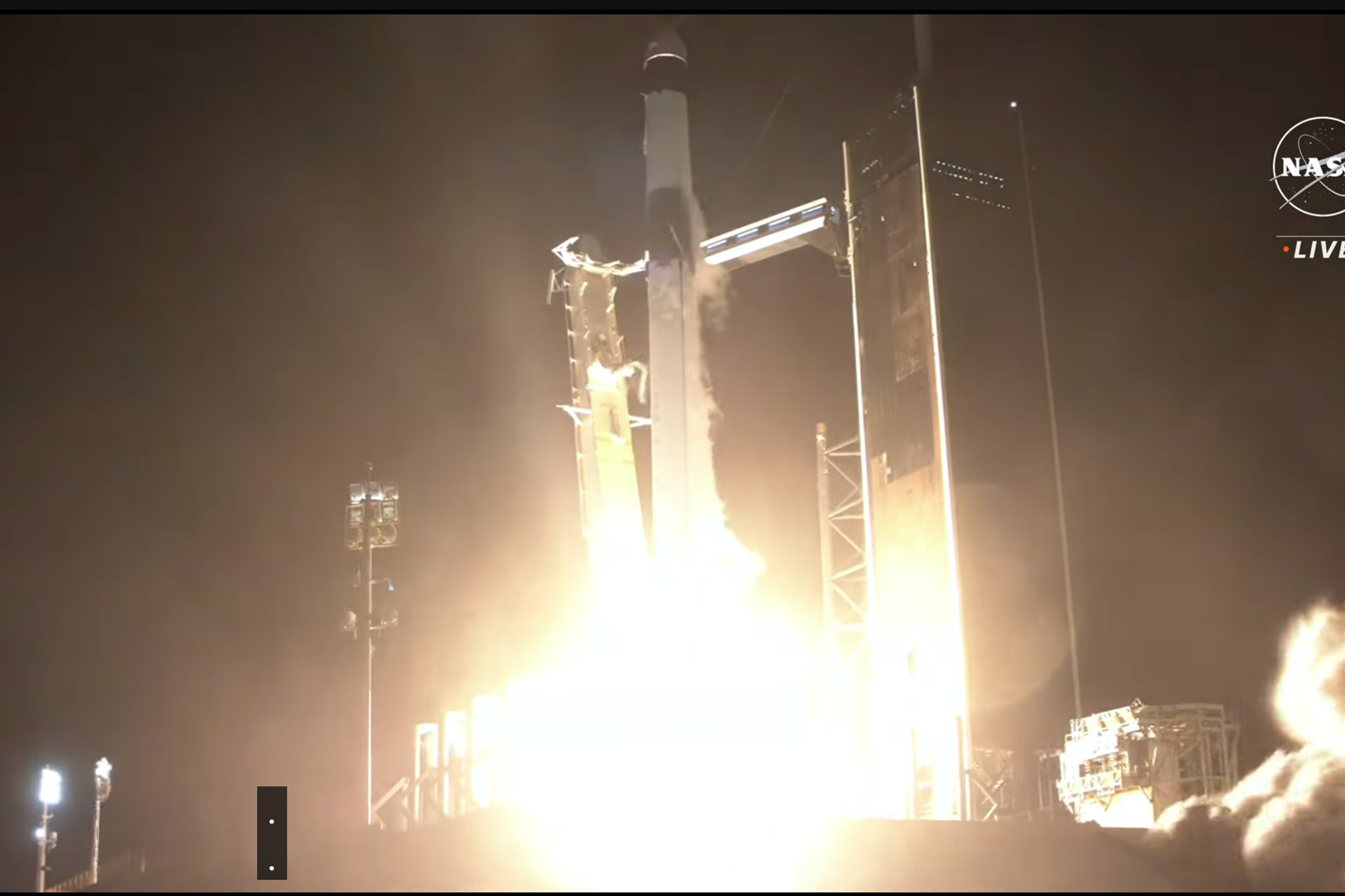 A screenshot of the Falcon-9 rocket lifting off.