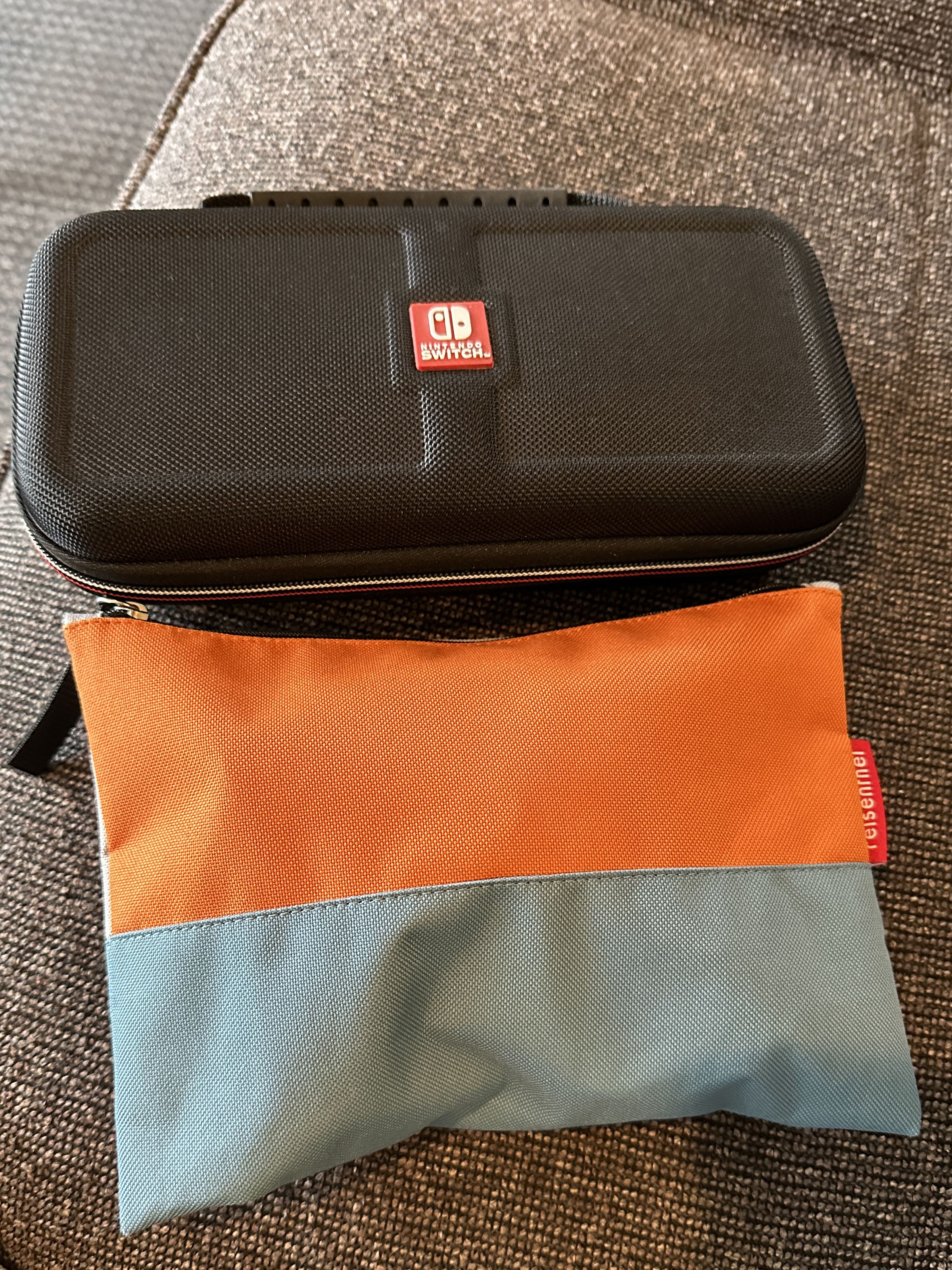 The Switch in its carrying case, and everything else in a little pencil pouch. What a time to be alive.