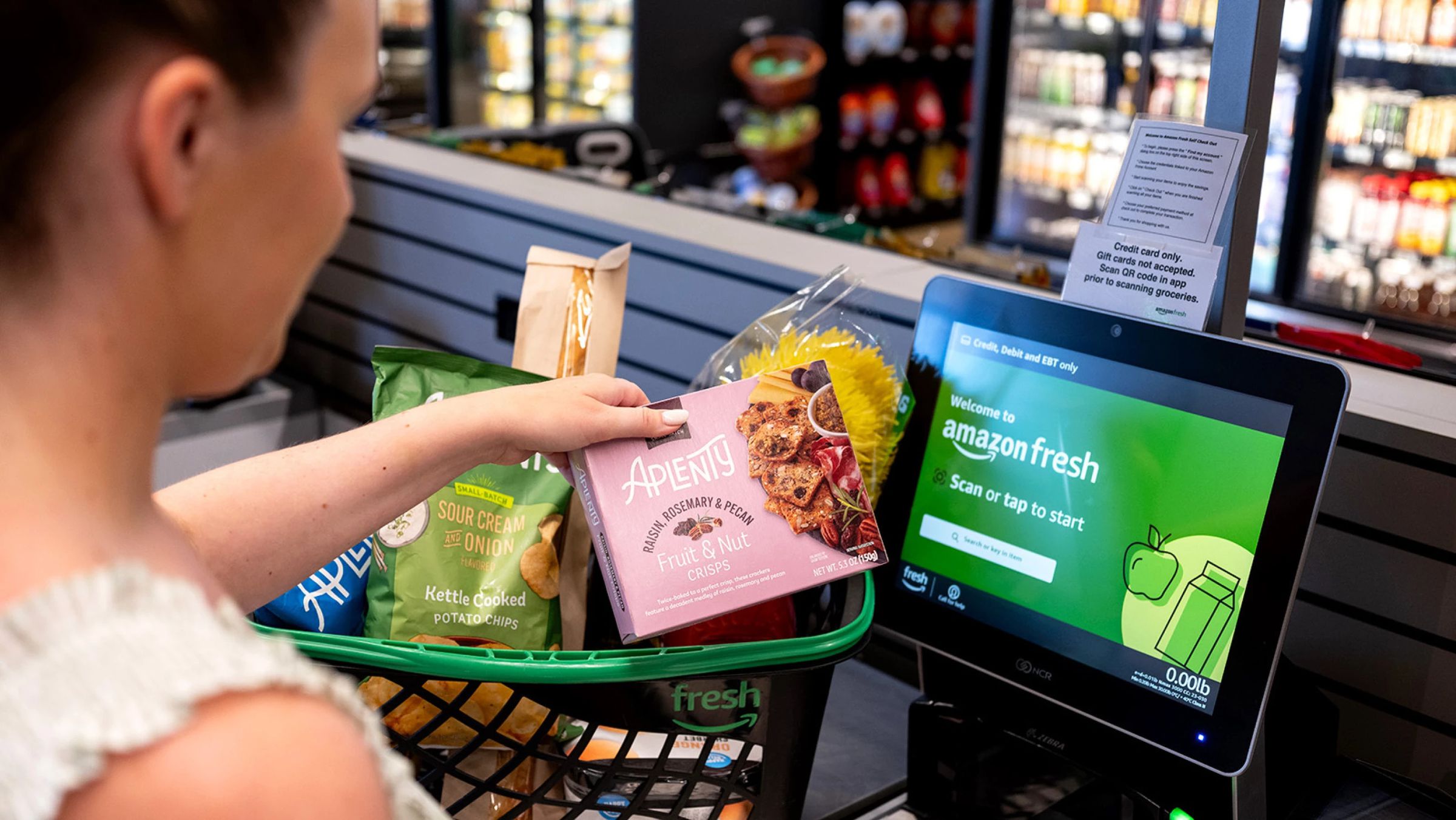 Amazon is adding self-checkout lanes to its Fresh stores.