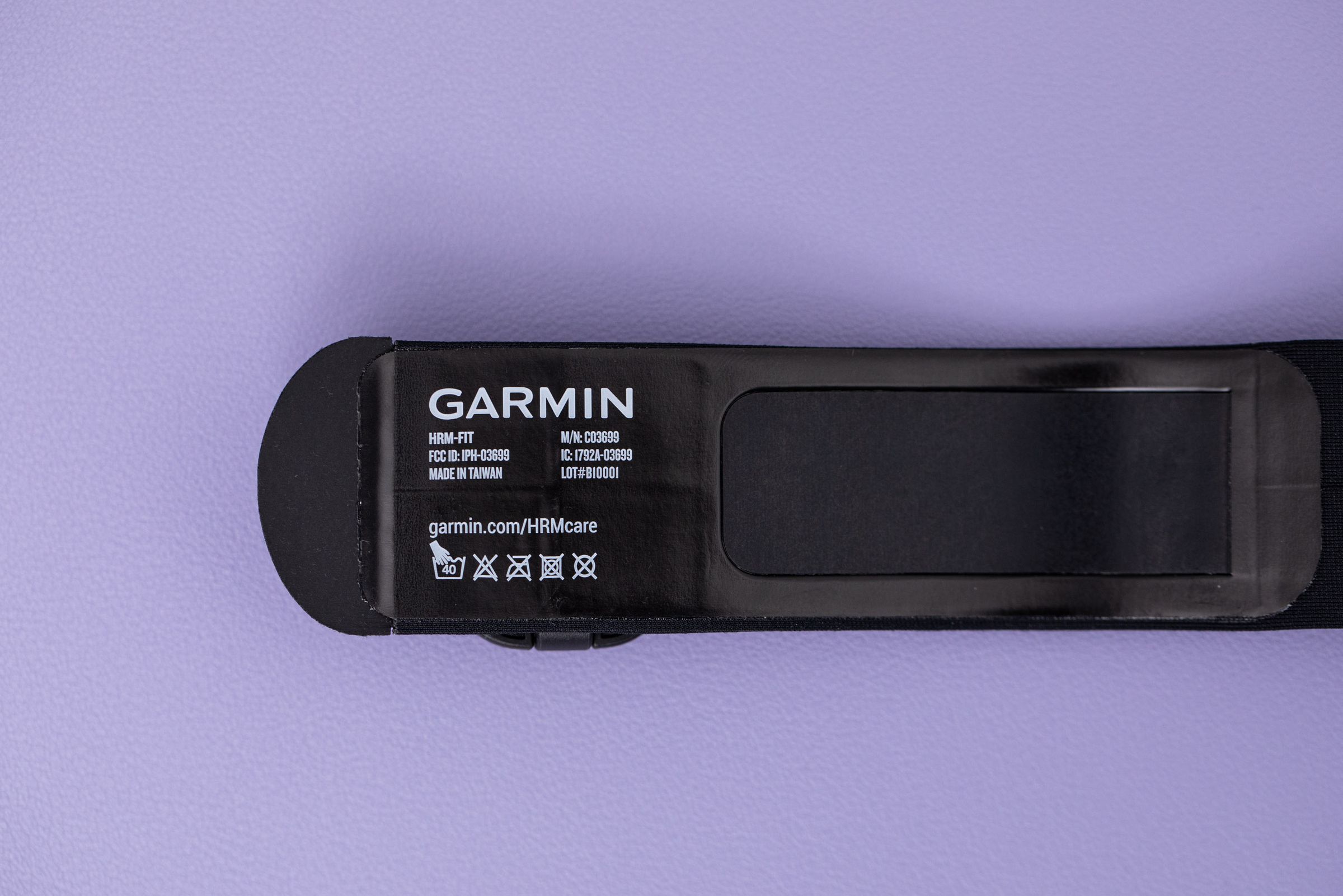 Close up of the electrodes on the Garmin HRM-Fit