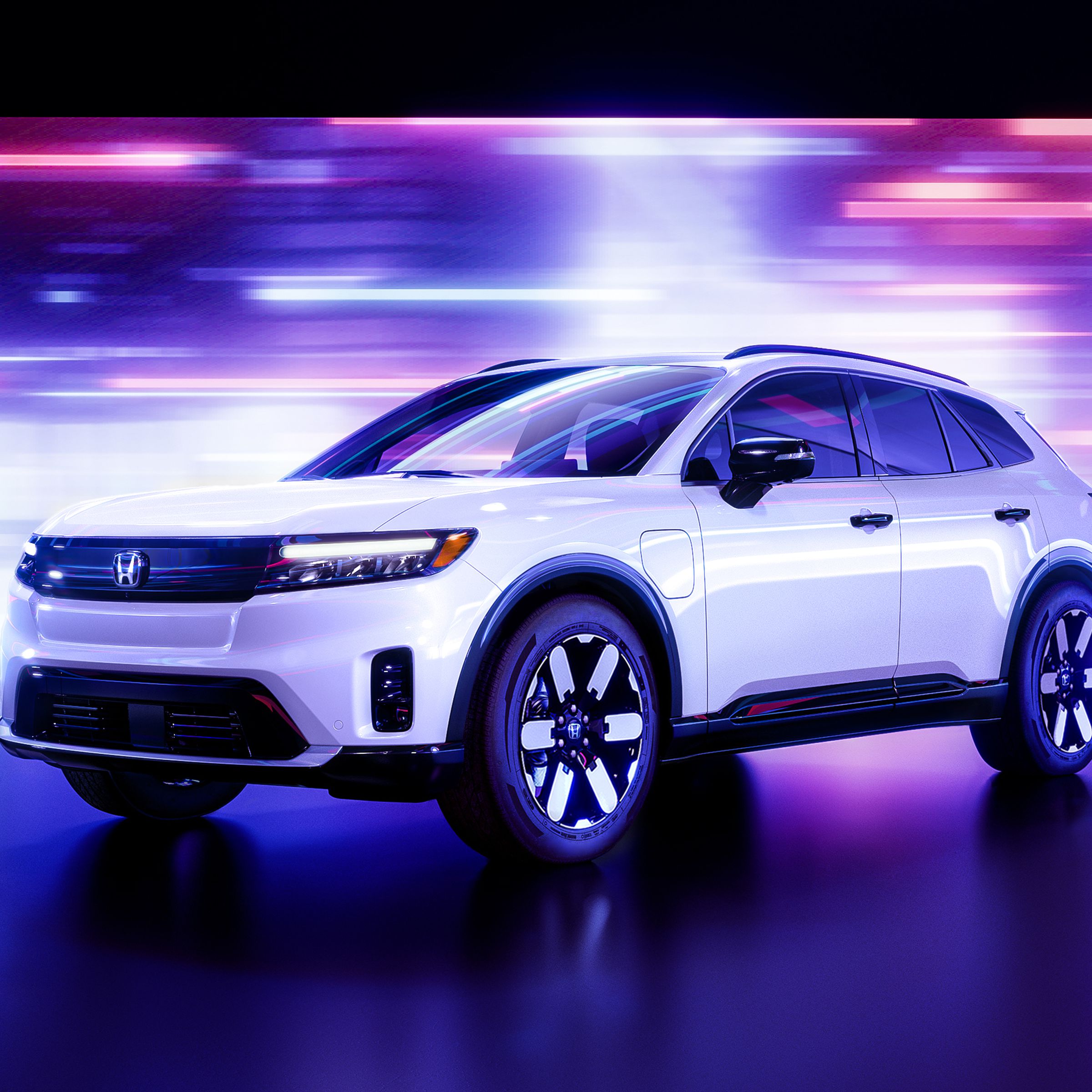 The 2024 Honda Prologue electric SUV against a white and purple background