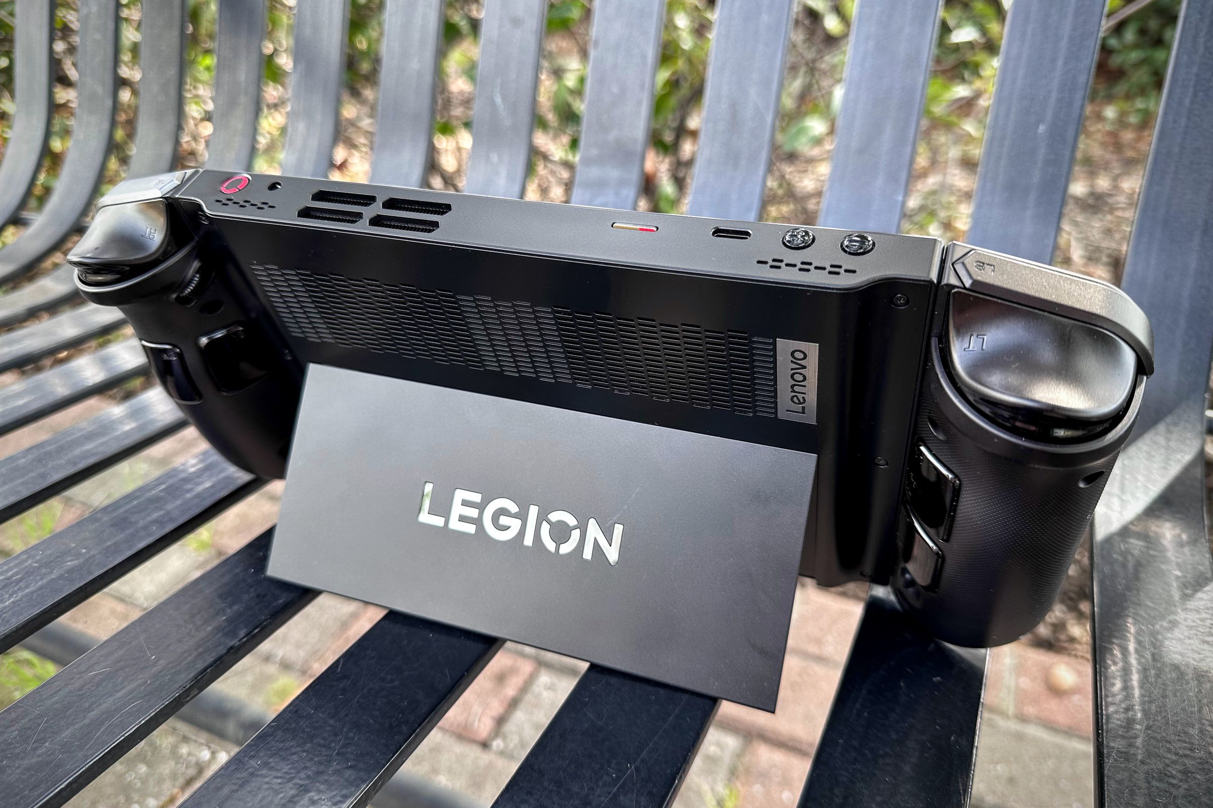 The Lenovo Legion Go, with its controllers attached and its kickstand unfolded.